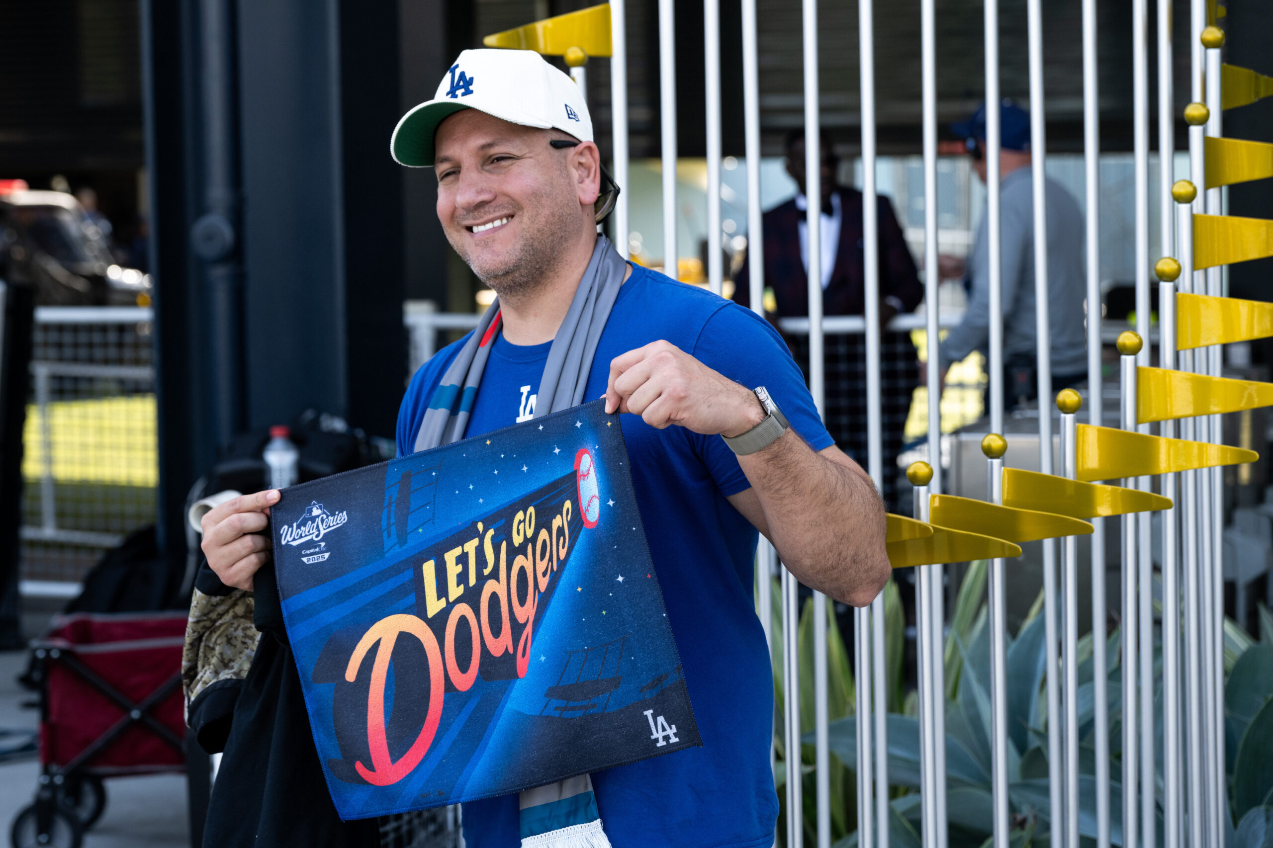Dodgers fan Eric Rodriguez of Los Angels poses in front...
