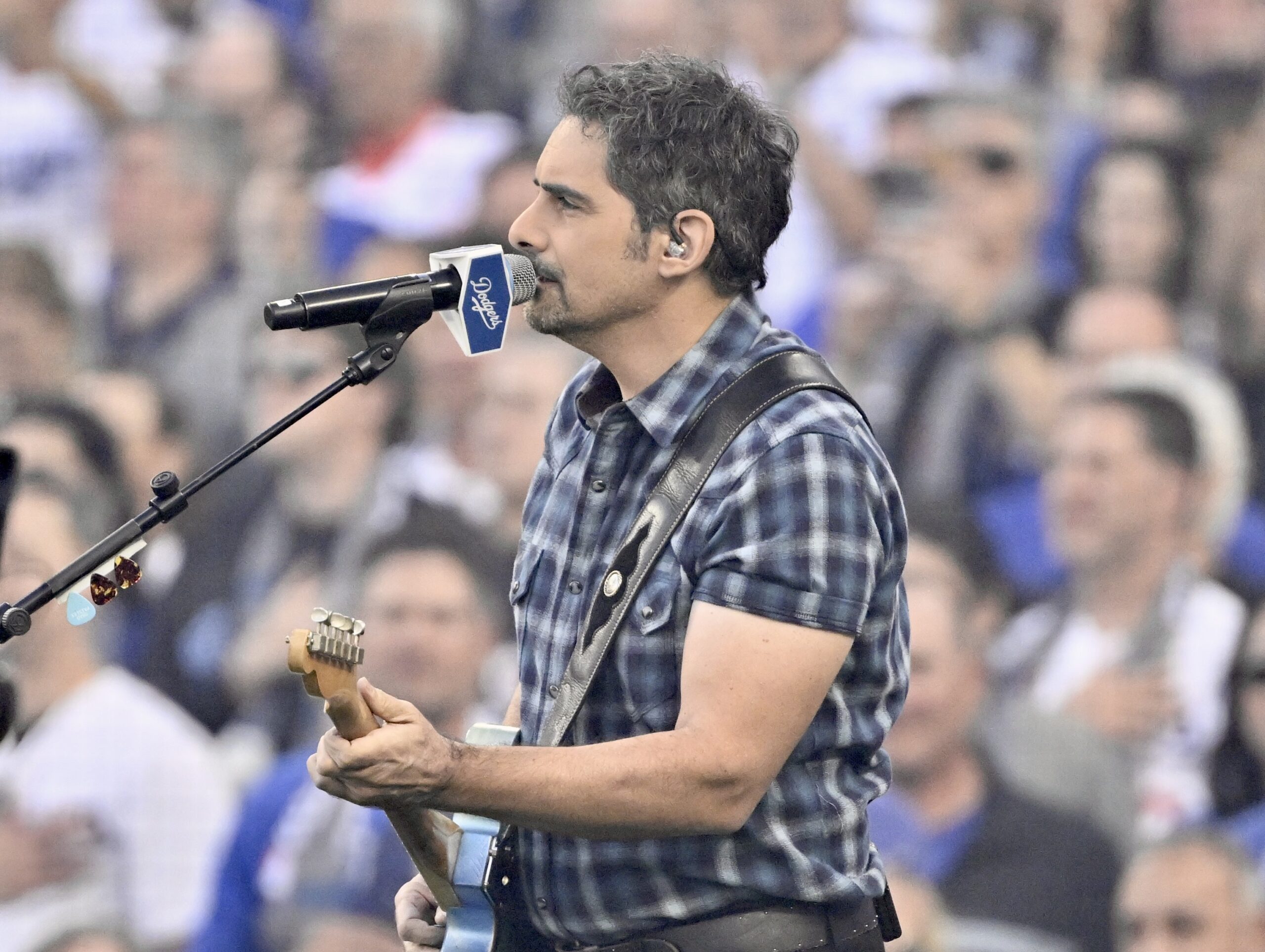 Brad Paisley performs the national anthem before Game 3 of...
