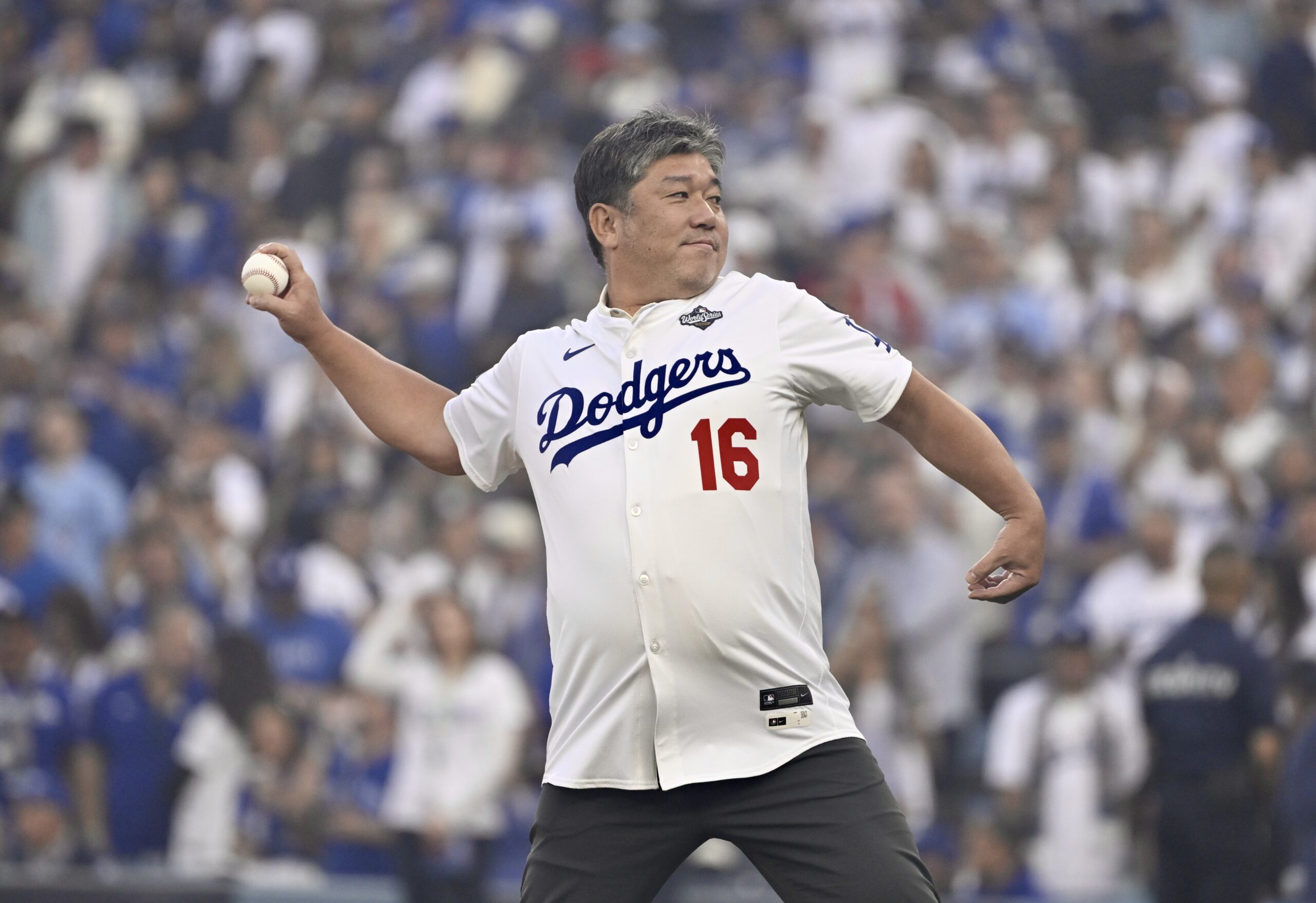 Former Dodgers pitcher Hideo Nomo throws out the ceremonial first...
