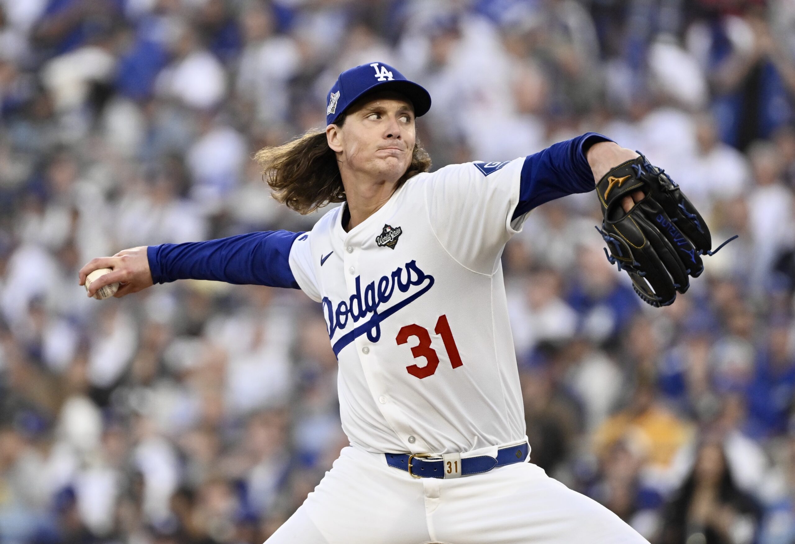 Dodgers starting pitcher Tyler Glasnow throws to the plate during...
