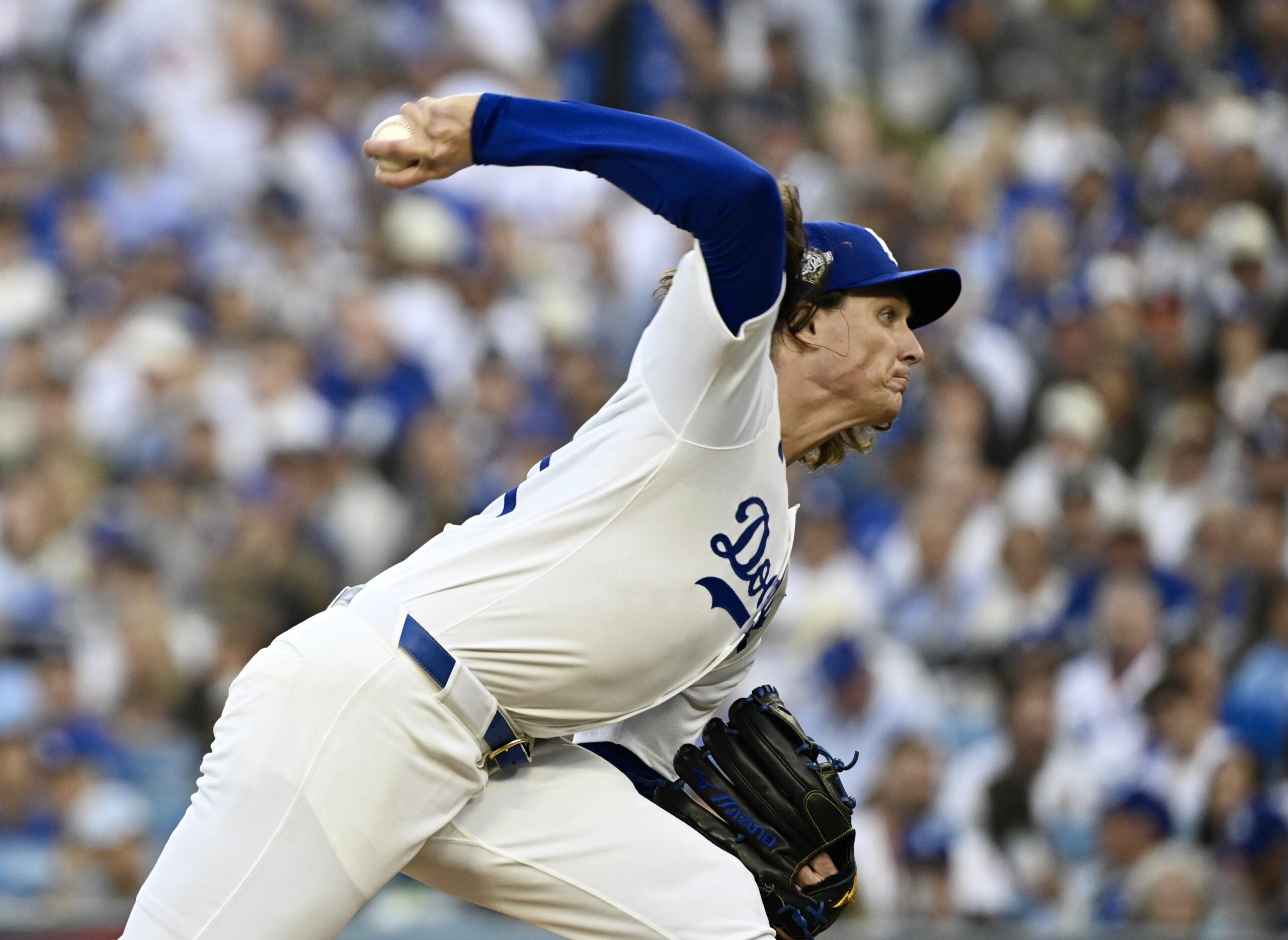 Dodgers starting pitcher Tyler Glasnow throws to the plate during...