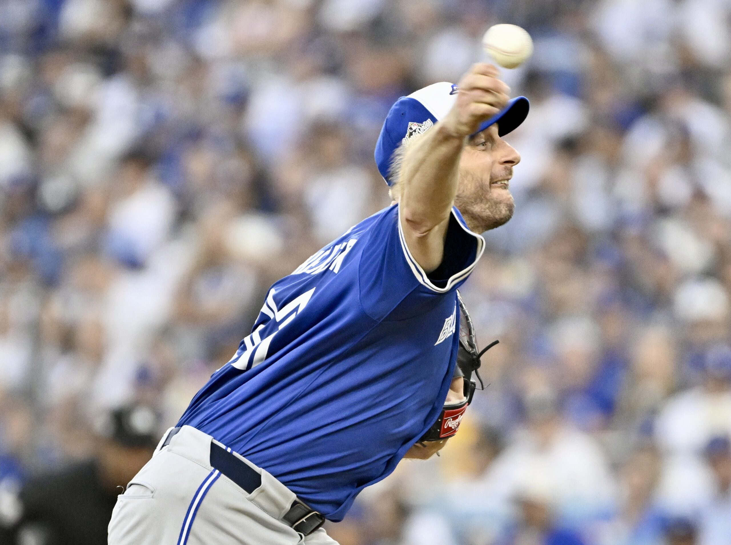 Toronto Blue Jays starting pitcher Max Scherzer throws to the...