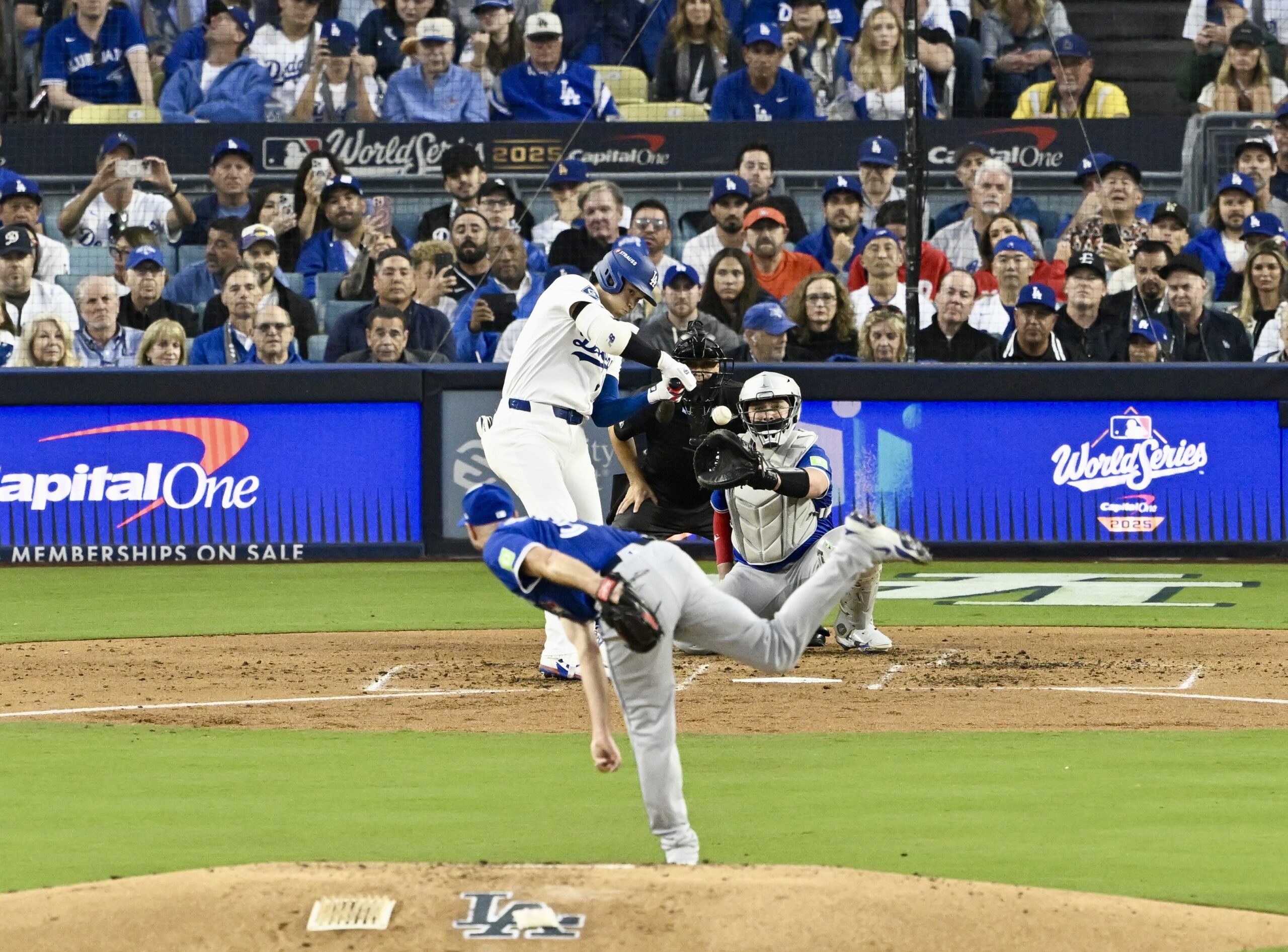 Dodgers star Shohei Ohtani hits a solo home run during...