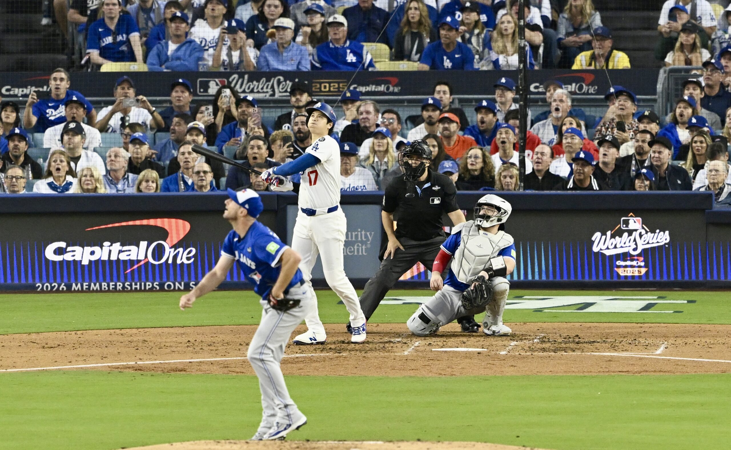 Dodgers star Shohei Ohtani hits a solo home run during...