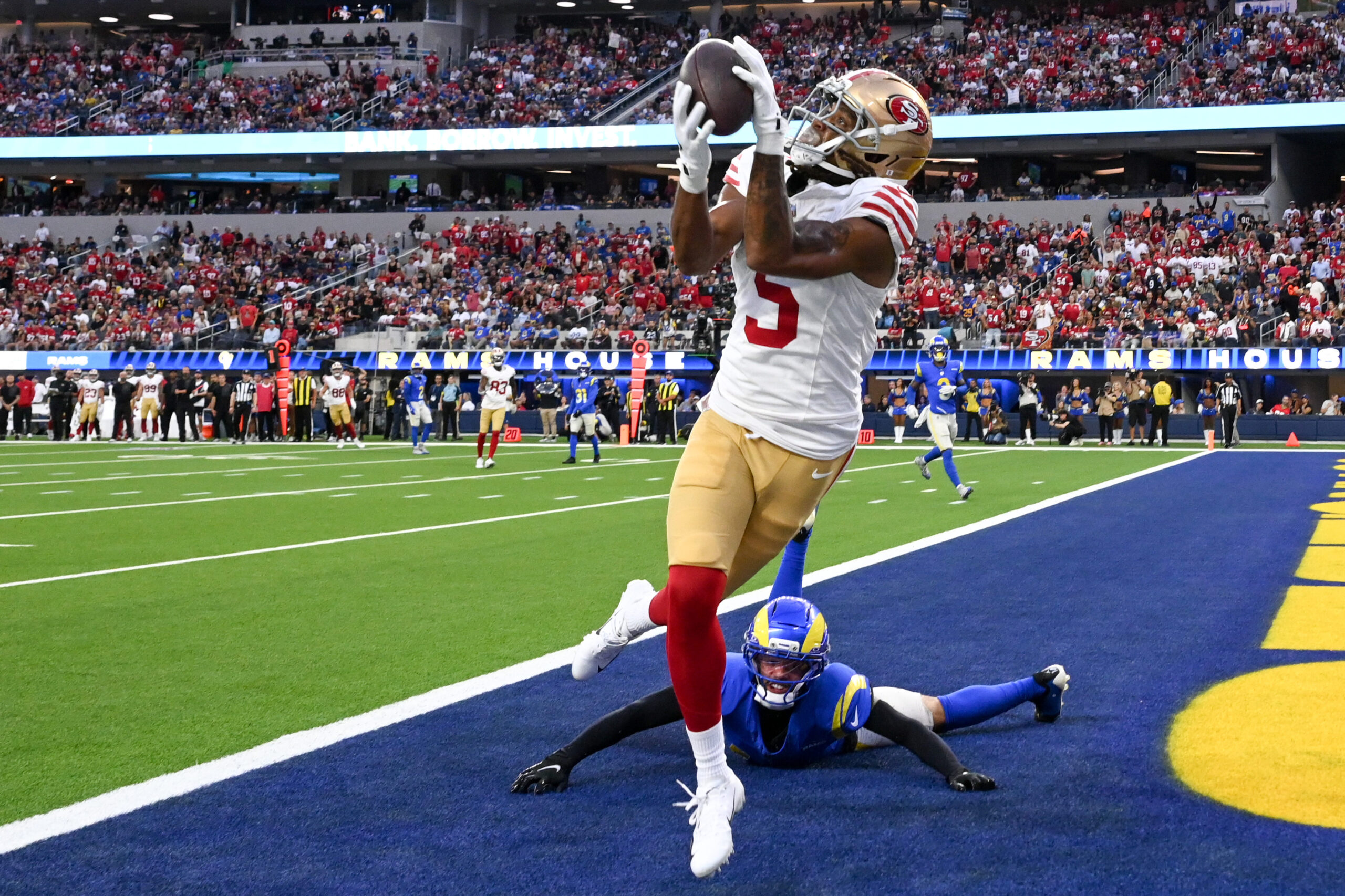 San Francisco 49ers wide receiver Demarcus Robinson catches the ball...