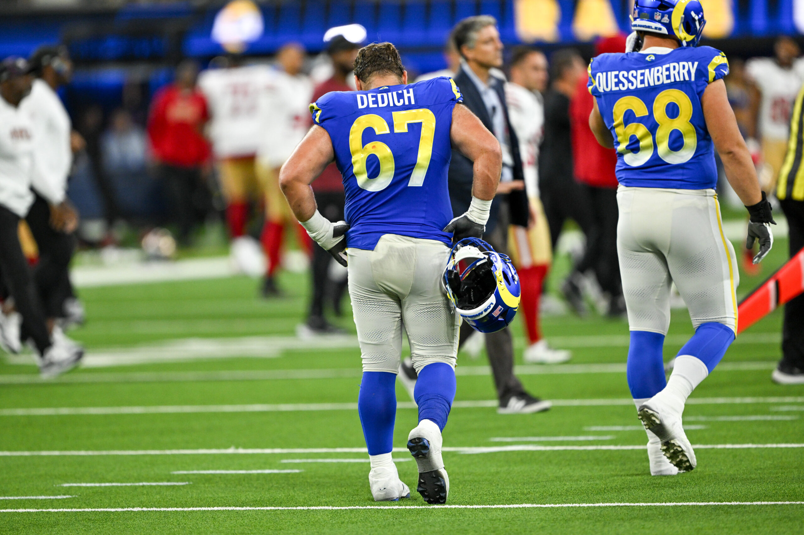 Rams offensive linemen Justin Dedich (67) and David Quessenberry (68)...