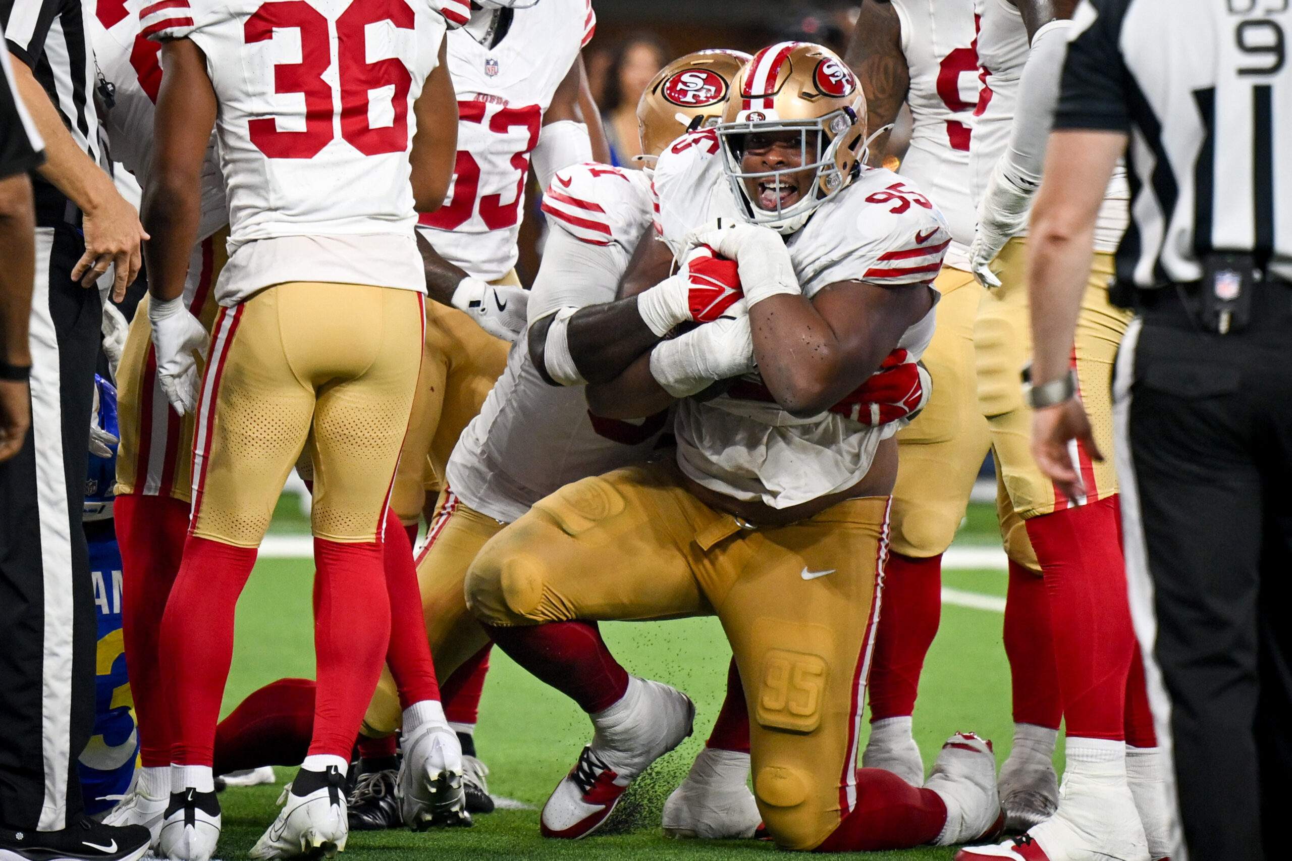 San Francisco 49ers defensive lineman Alfred Collins (95) smiles after...