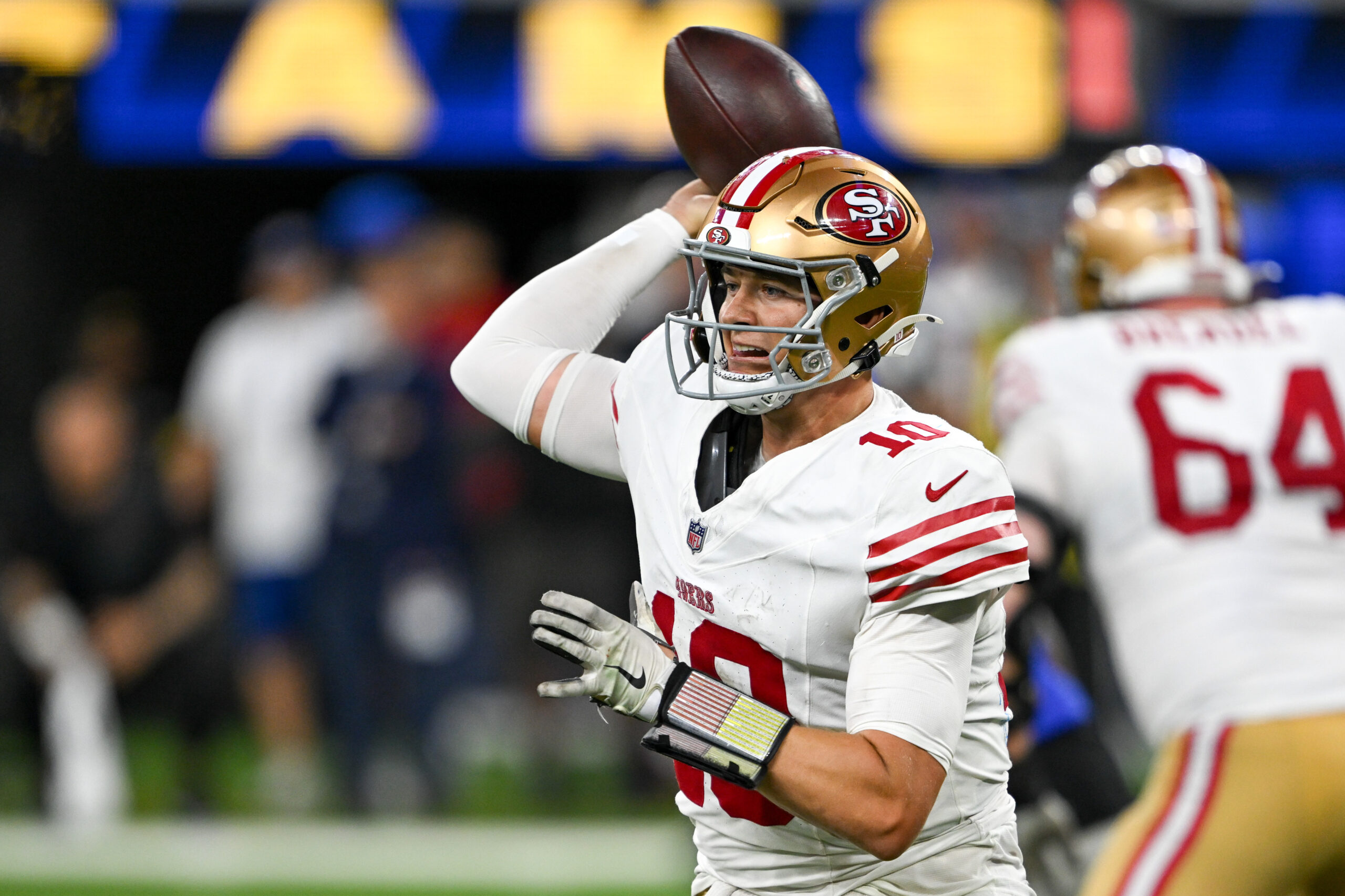 49ers Mac Jones (10) passes against the Rams in Thursday...