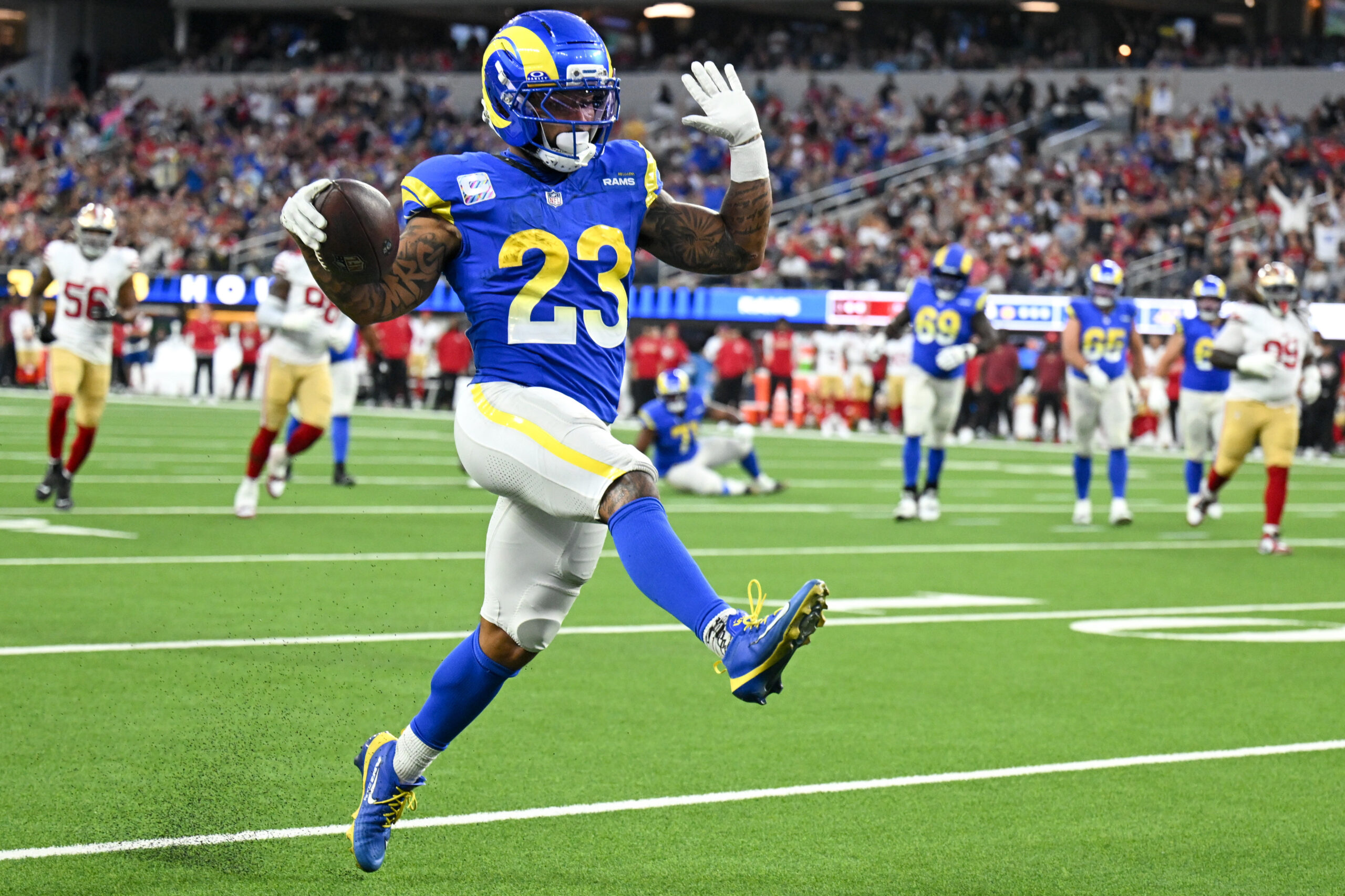 Rams running back Kyren Williams dances into the end zone...