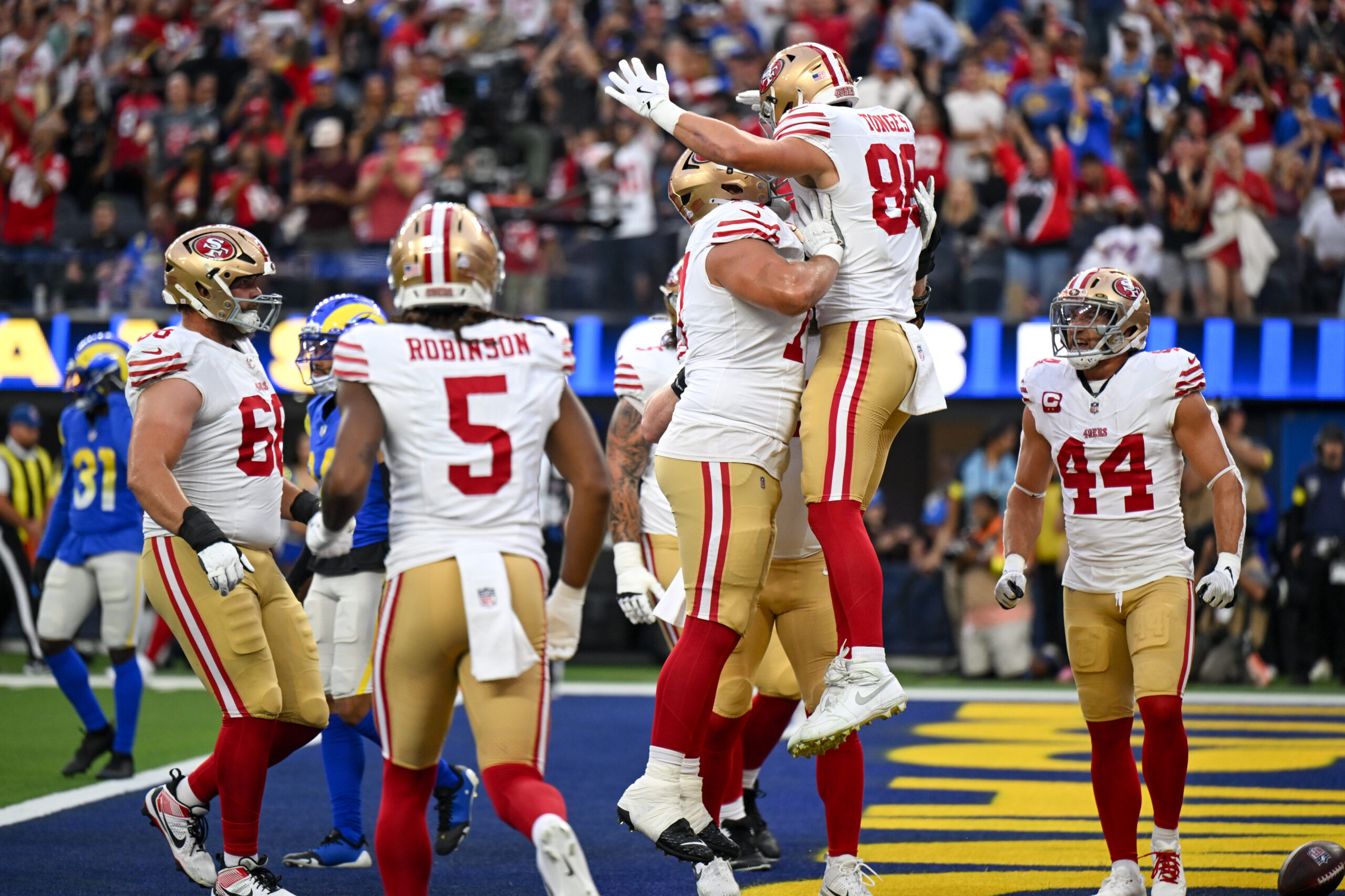 San Francisco 49ers tight end Jake Tonges (88) celebrates with...