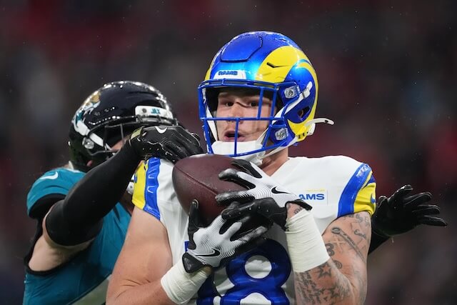 Oct 19, 2025; London, United Kingdom; Los Angeles Rams tight end Terrance Ferguson (18) makes a catch against Jacksonville Jaguars safety Andrew Wingard (42) during the second half of an NFL International Series game at Wembley Stadium. Mandatory Credit: Kirby Lee-Imagn Images Terrance Ferguson, Rams, Jaguars