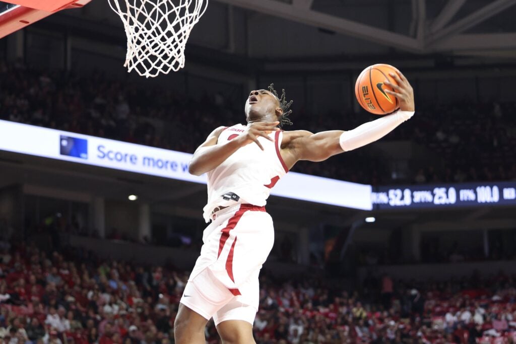 Nov 22, 2024; Fayetteville, Arkansas, USA; Arkansas Razorbacks forward Adou Thiero (3) goes up for a dunk in the second half against the Little Rock Trojans at Bud Walton Arena. Arkansas won 79-67. Mandatory Credit: Nelson Chenault-Imagn Images