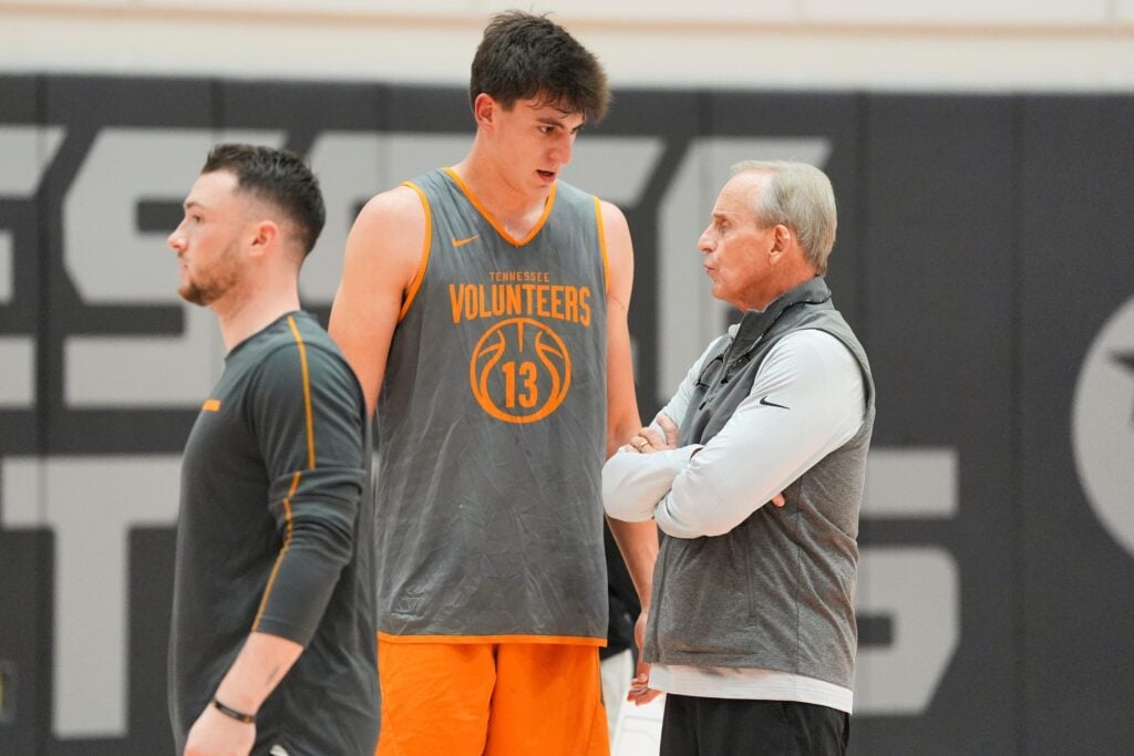 Tennessee forward J.P. Estrella (13) with coach Rick Barnes during Tennessee basketball's media day and practice held at Pratt Pavilion on Oct. 9, 2025. © Brianna Paciorka/News Sentinel / USA TODAY NETWORK via Imagn Images
