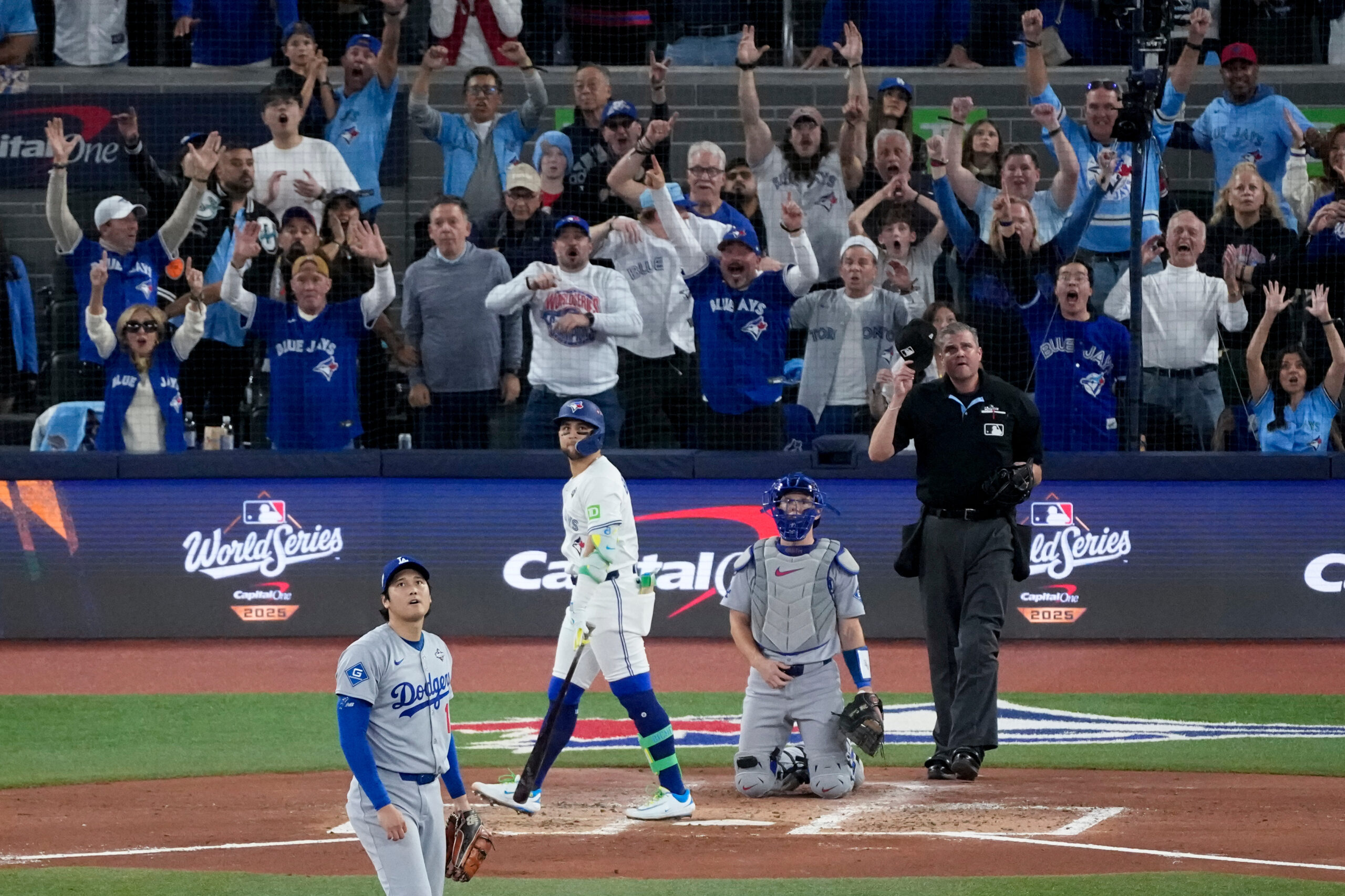 The Toronto Blue Jays’ Bo Bichette watches his three-run home...
