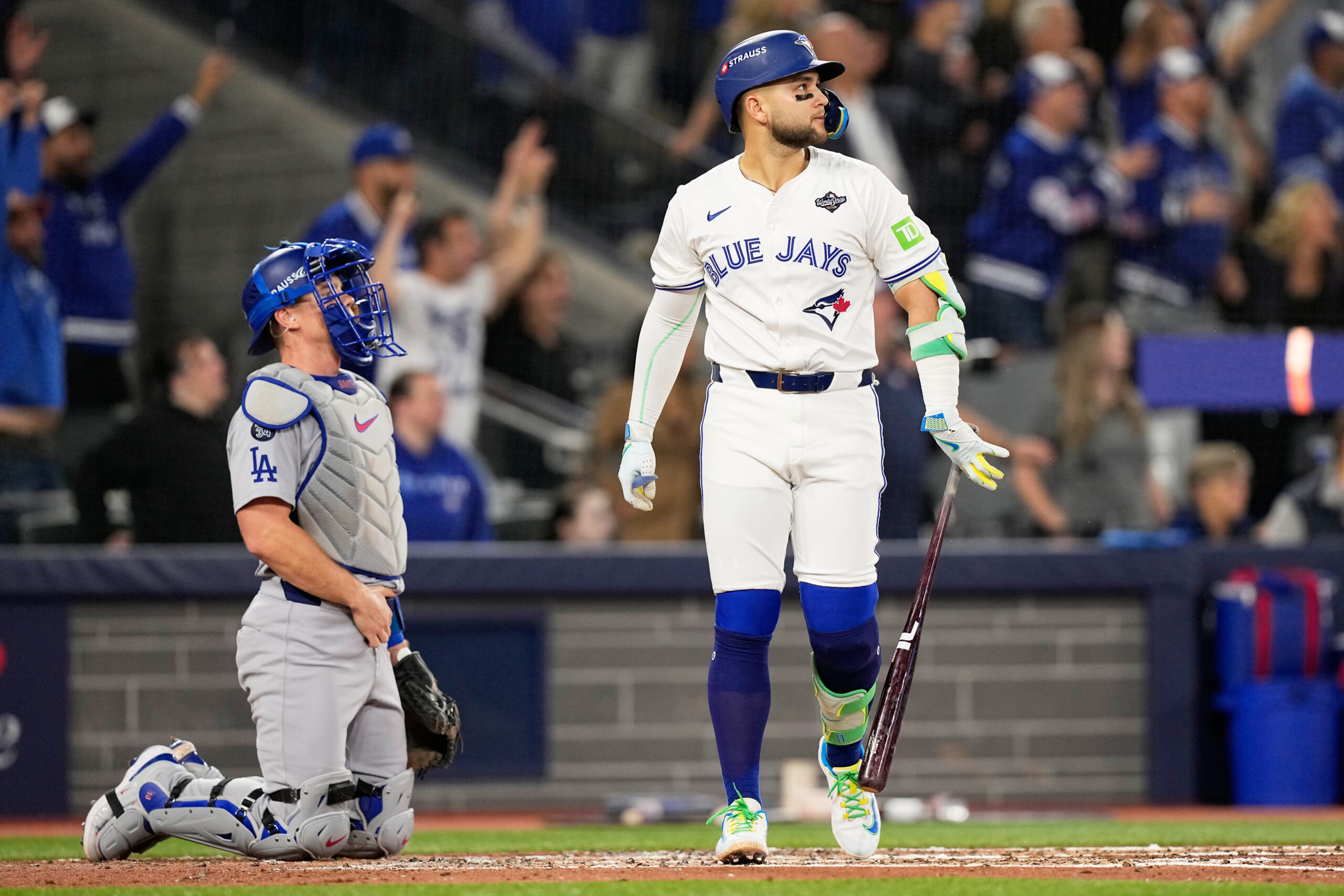 The Toronto Blue Jays’ Bo Bichette watches his three-run home...
