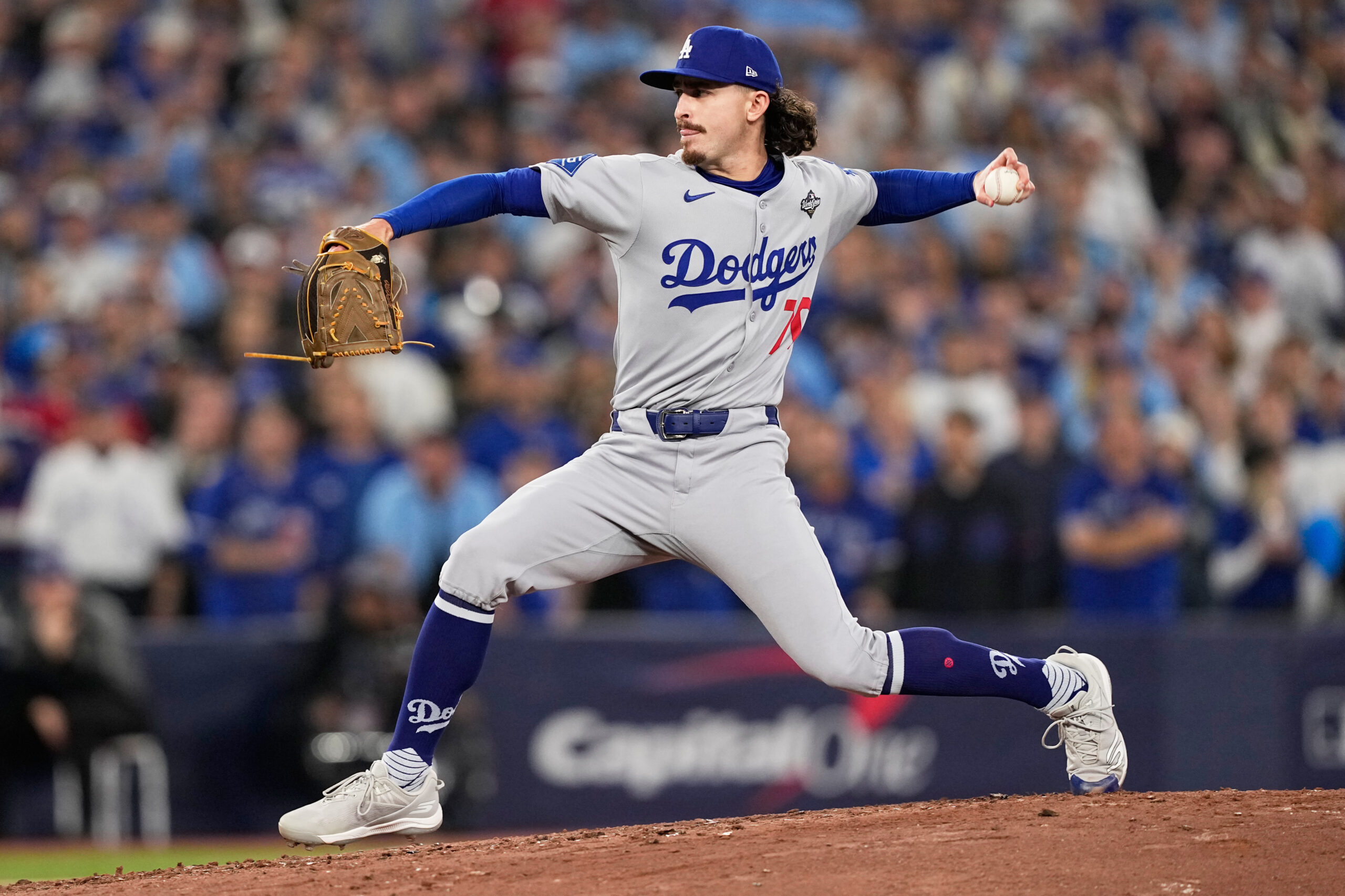 Dodgers relief pitcher Justin Wrobleski throws to the plate during...