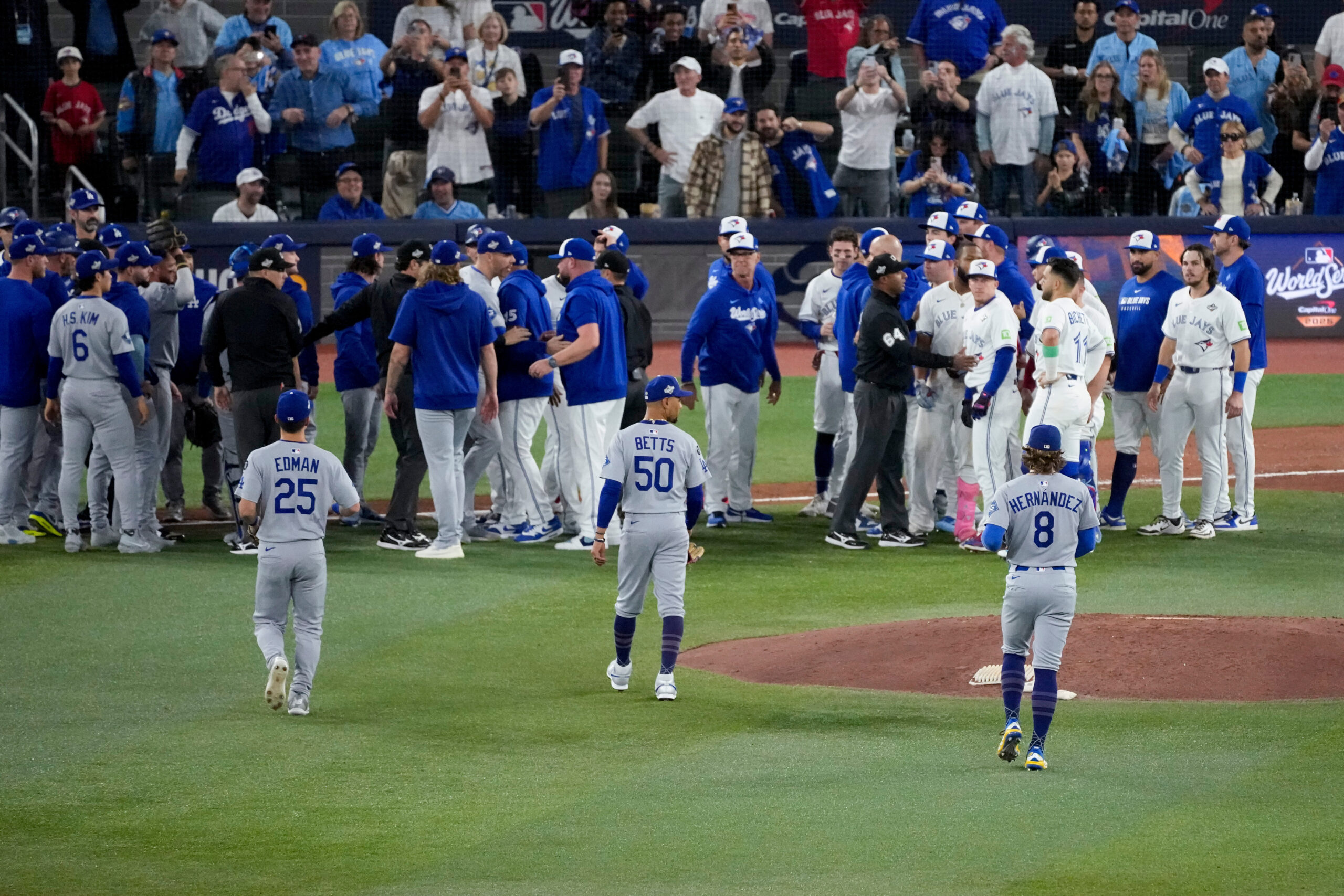 The Dodgers’ and the Toronto Blue Jays’ benches clear after...