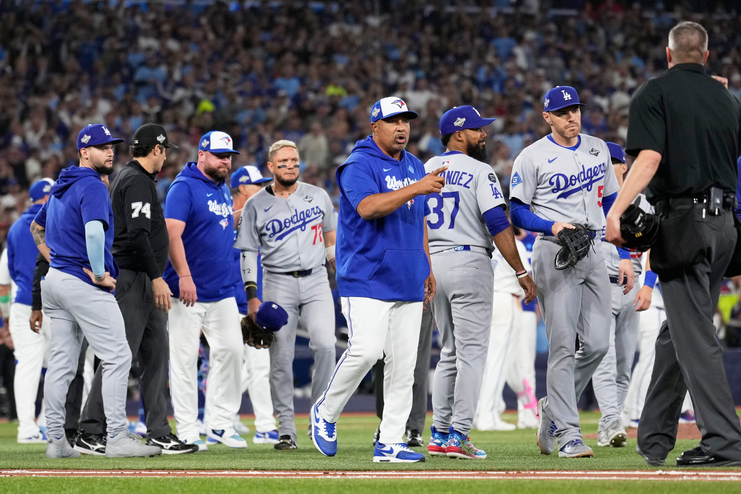 Dodgers manager Dave Roberts reacts after the Toronto Blue Jays...