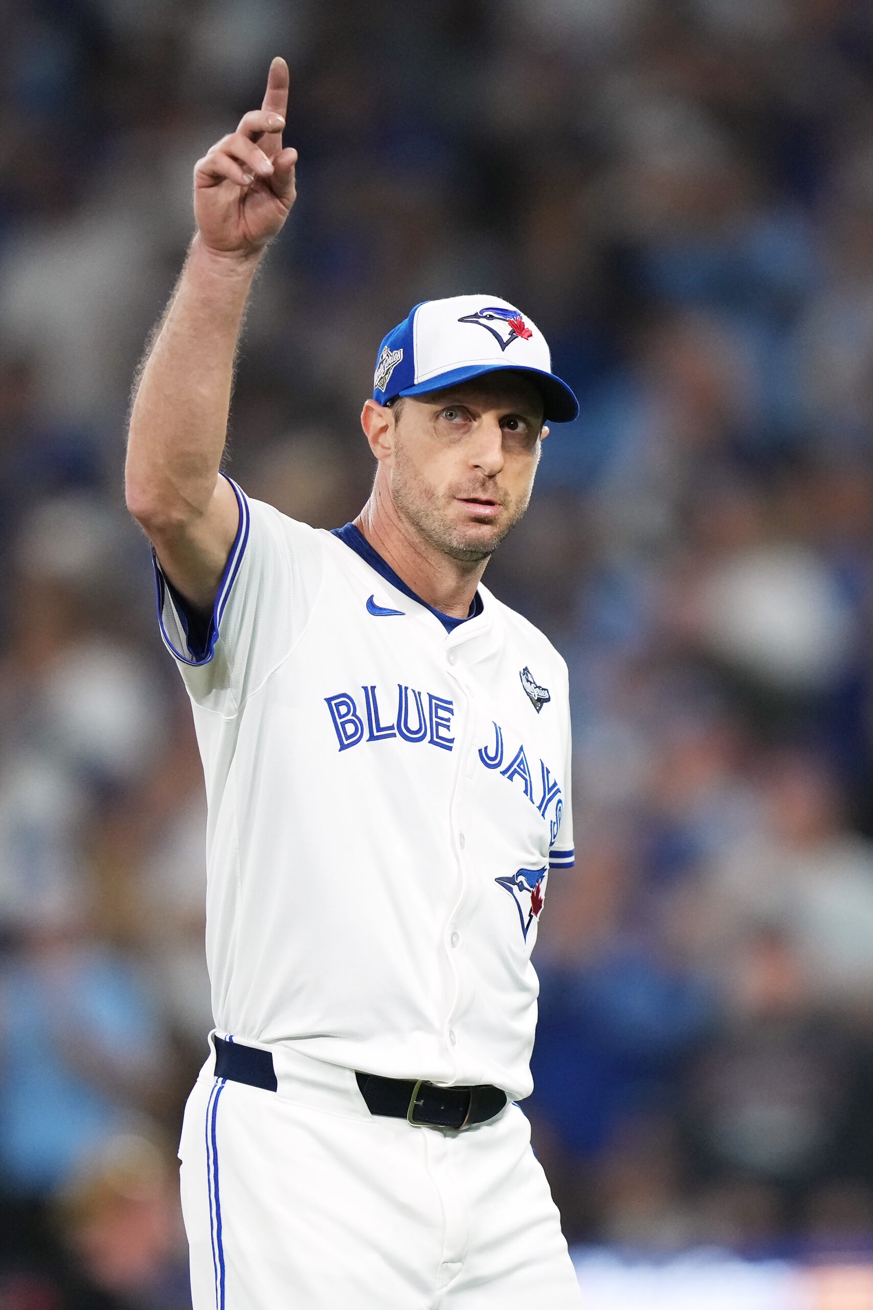 Toronto Blue Jays starting pitcher Max Scherzer waves to the...