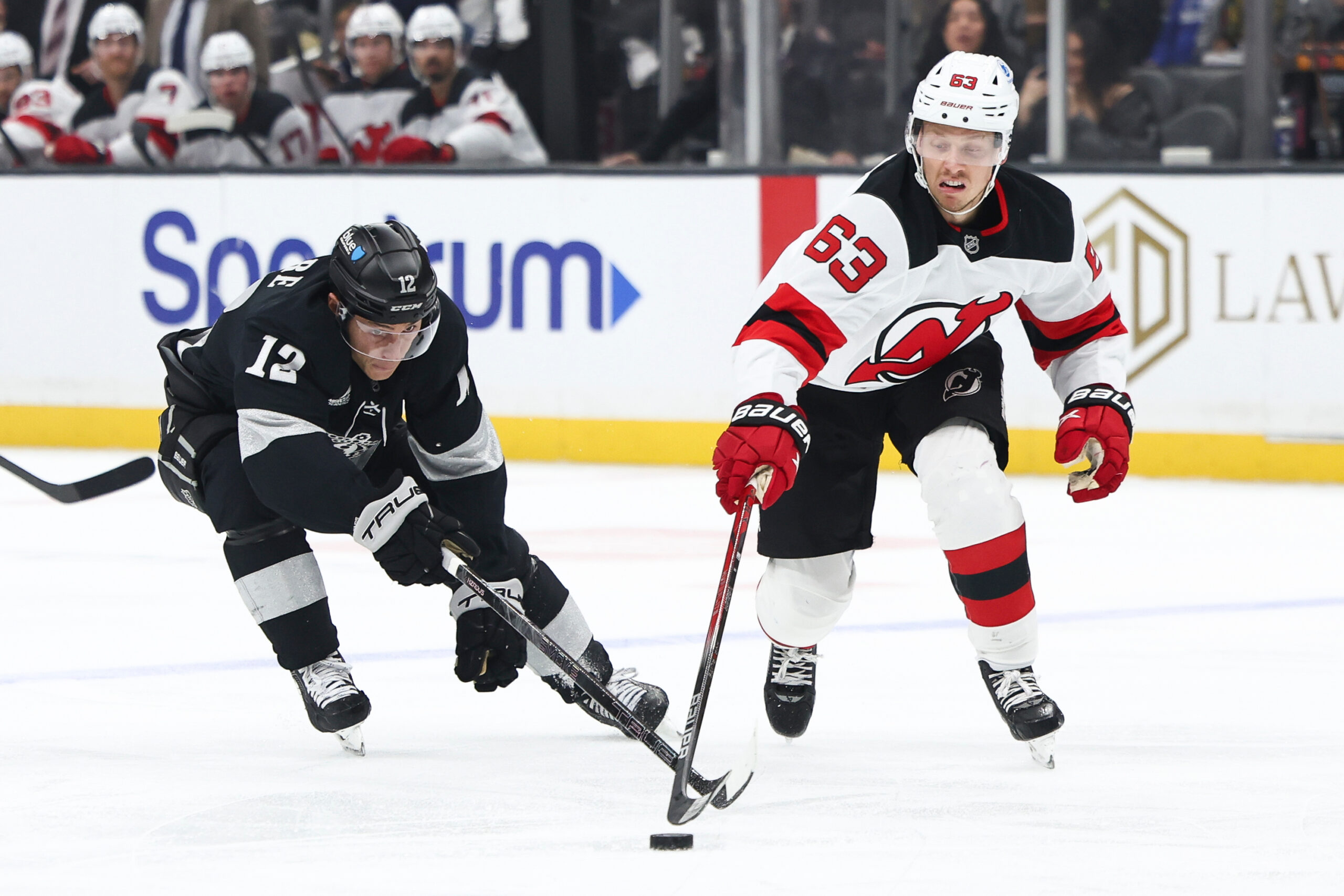New Jersey Devils left wing Jesper Bratt (63) and Kings...