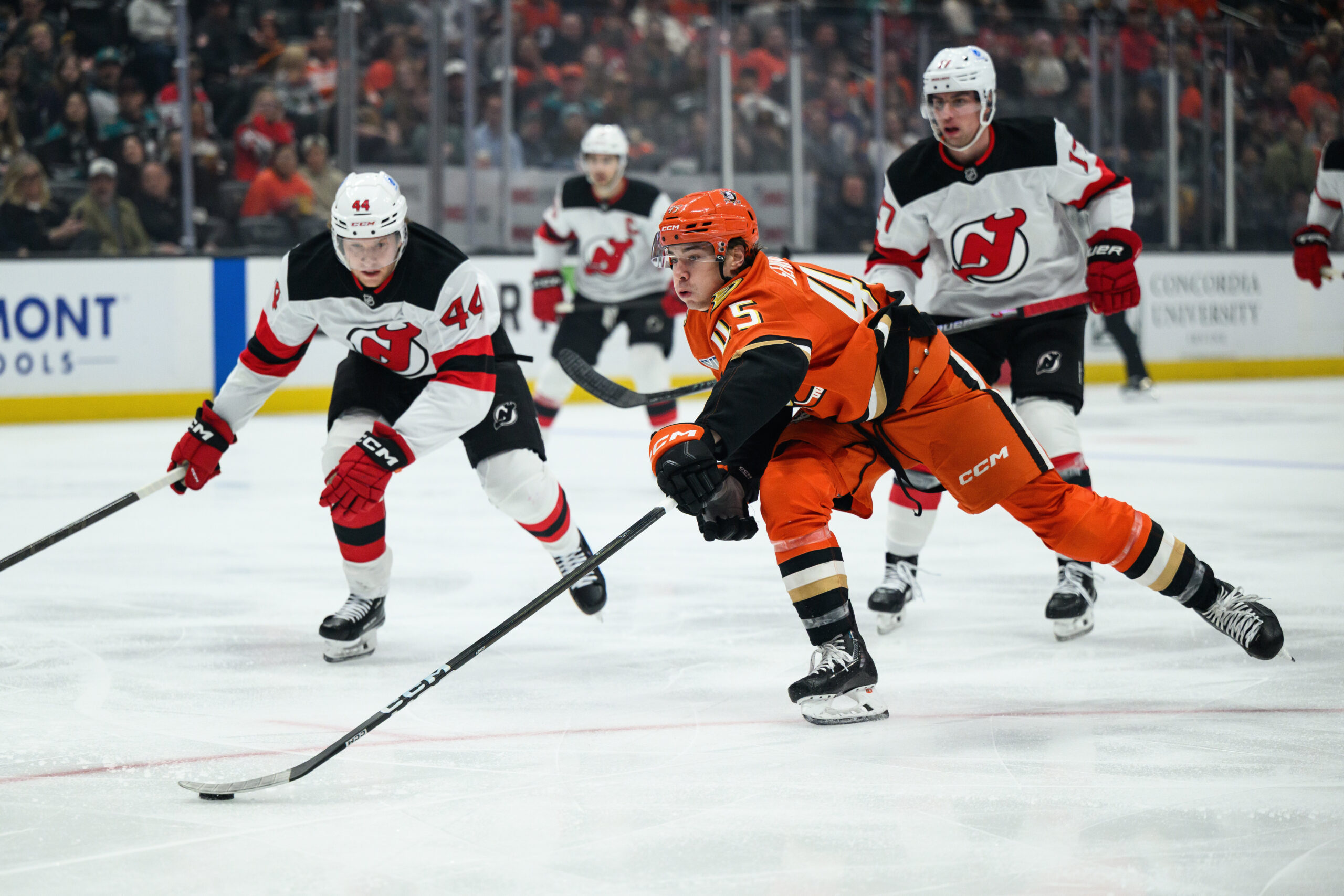 Ducks right wing Beckett Sennecke (45) gathers the puck during...