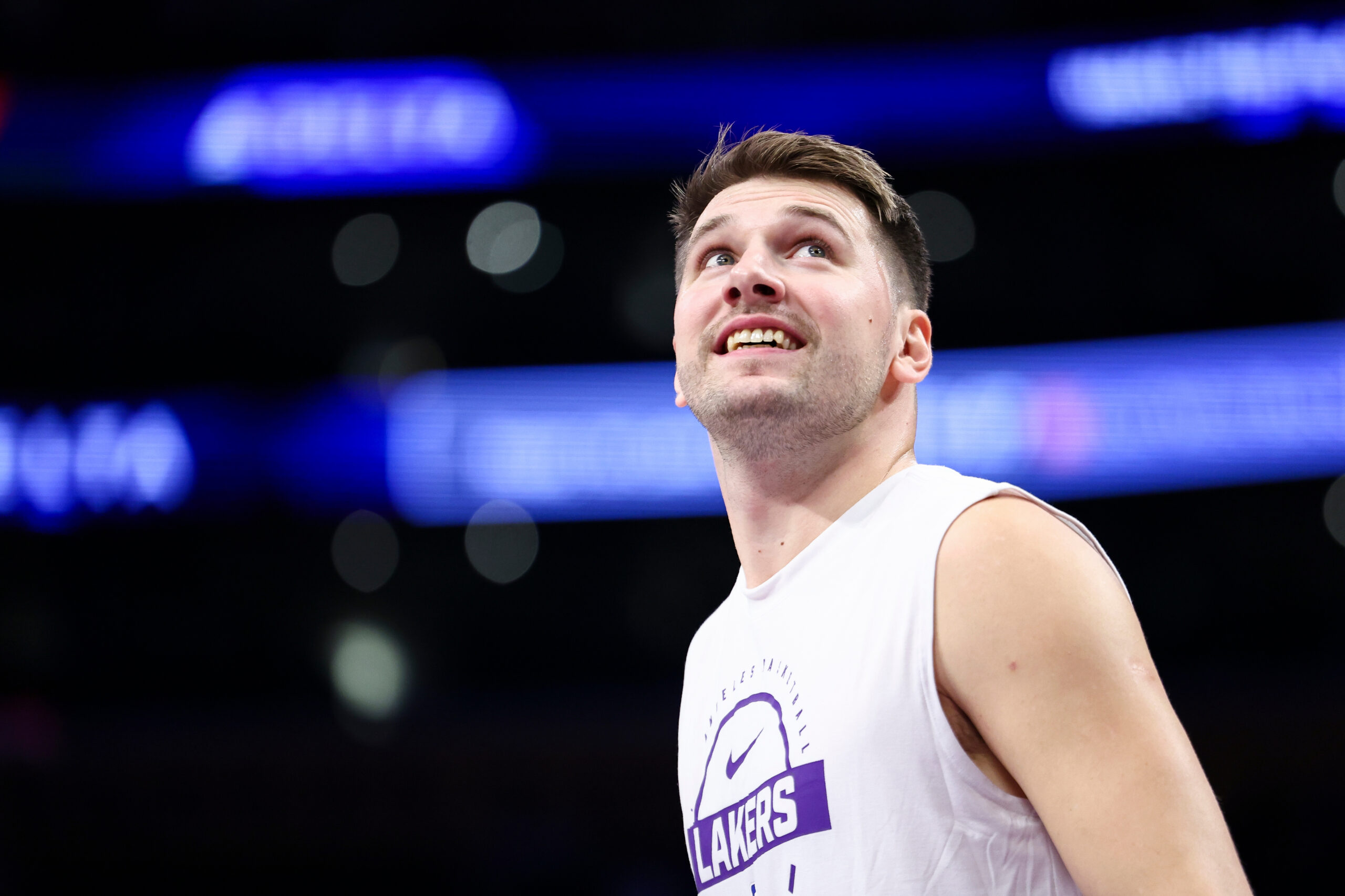 Lakers guard Luka Doncic reacts during warmups before an NBA...