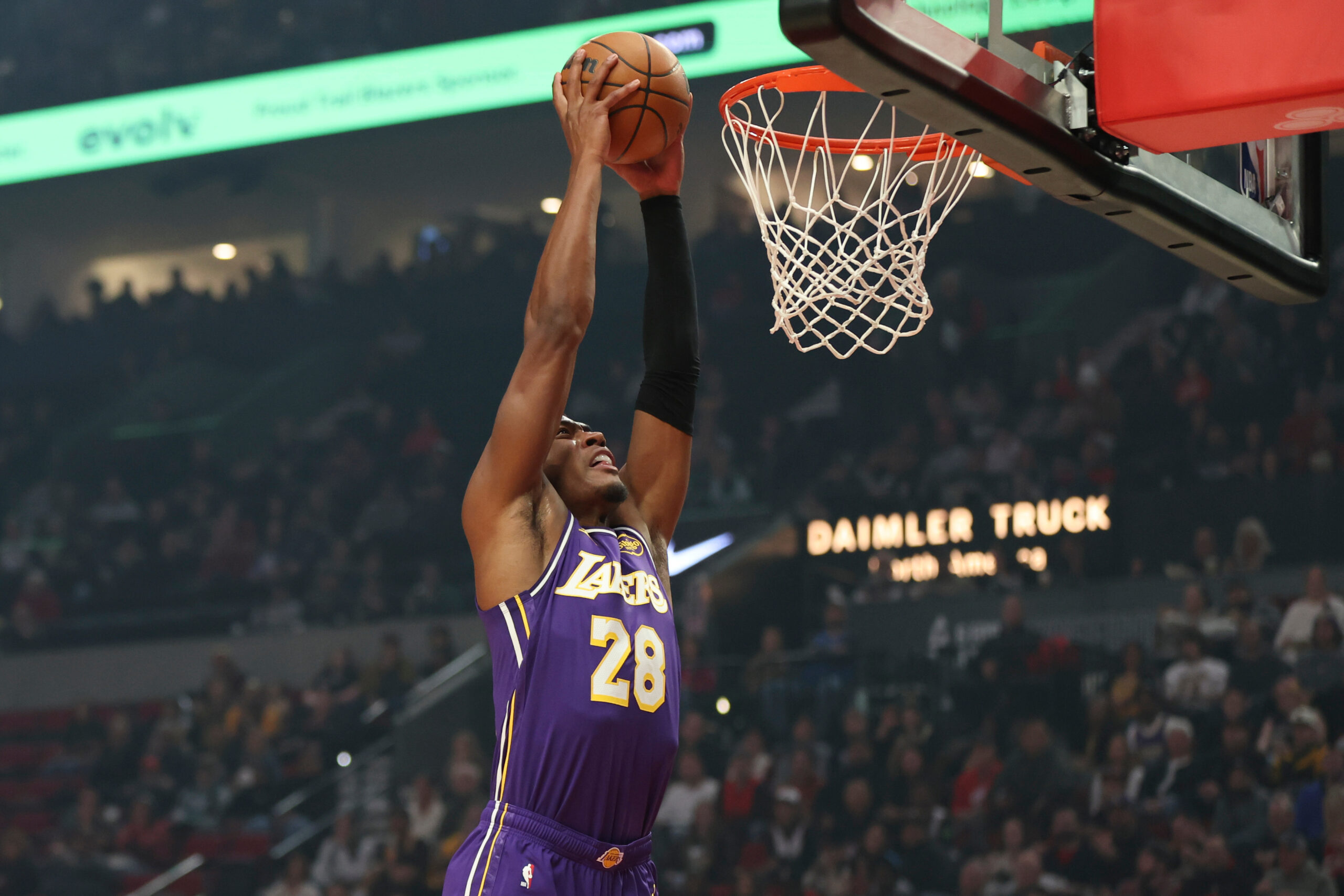 Lakers forward Rui Hachimura dunks against the Portland Trail Blazers...