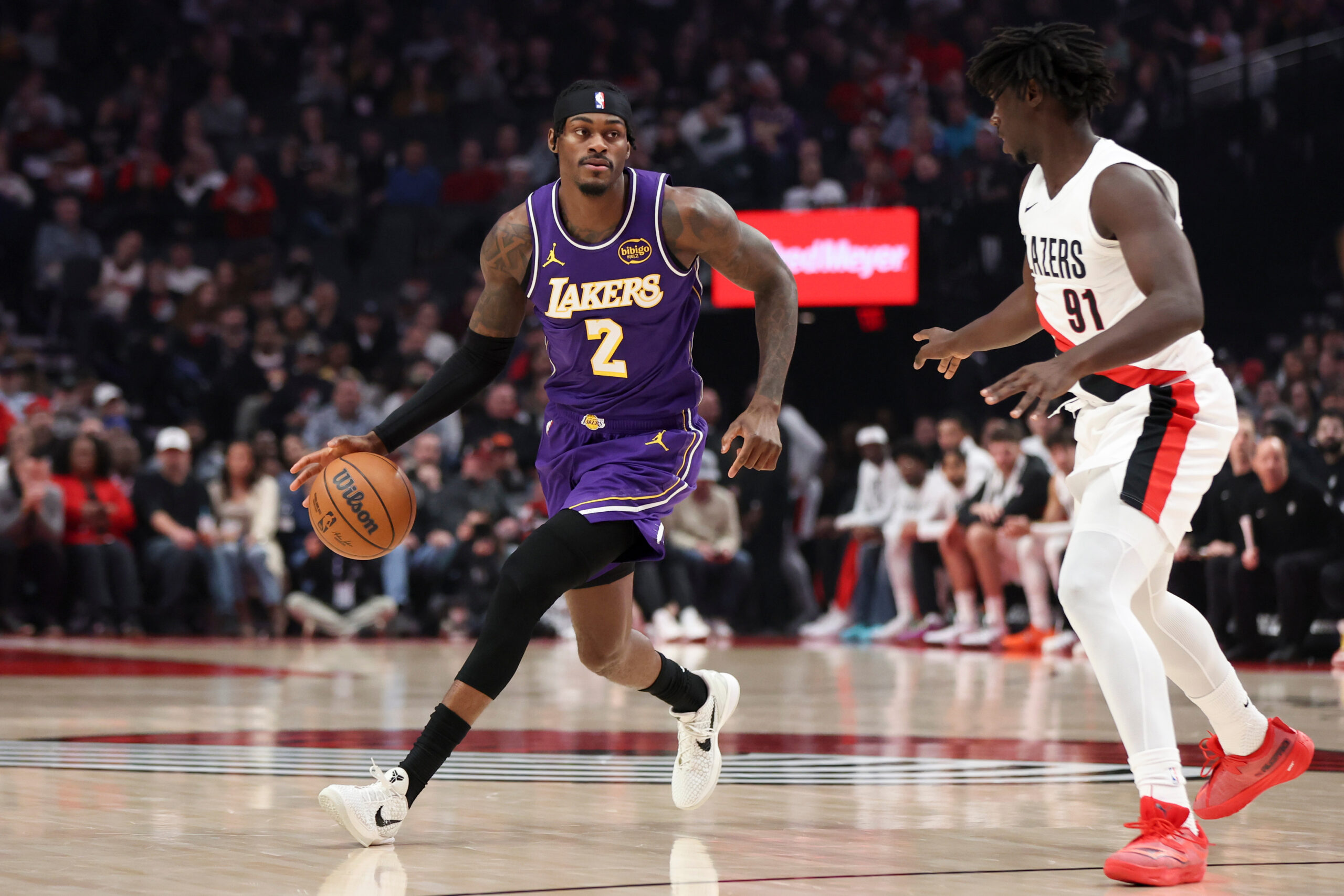 Lakers forward Jarred Vanderbilt (2) brings the ball upcourt as...