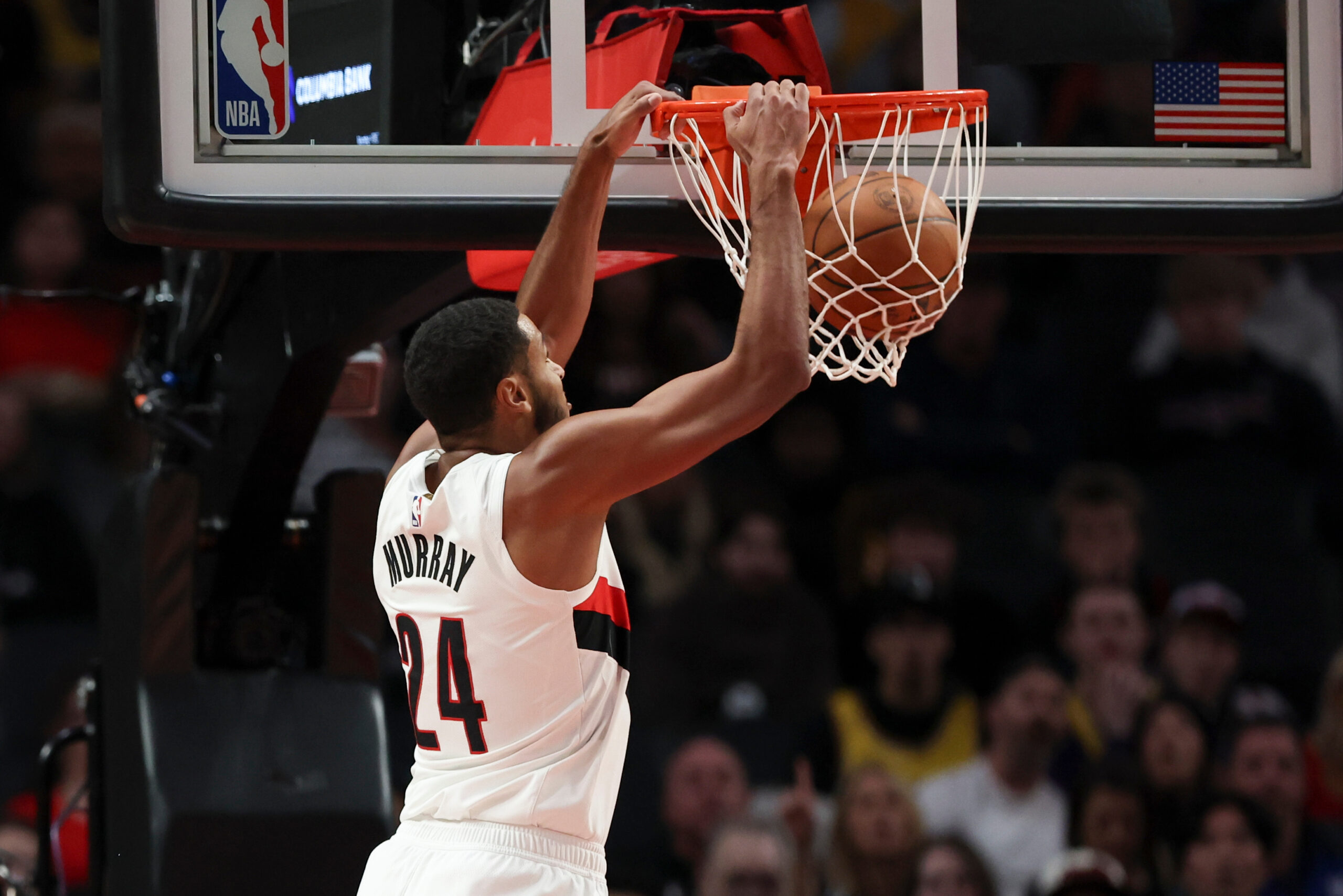 Portland Trail Blazers forward Kris Murray (24) dunks against the...