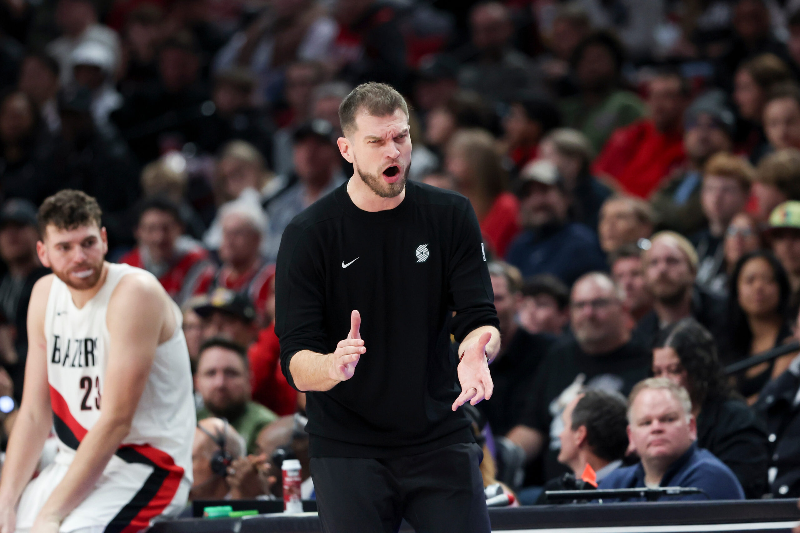 Portland Trail Blazers acting head coach Tiago Splitter reacts during...