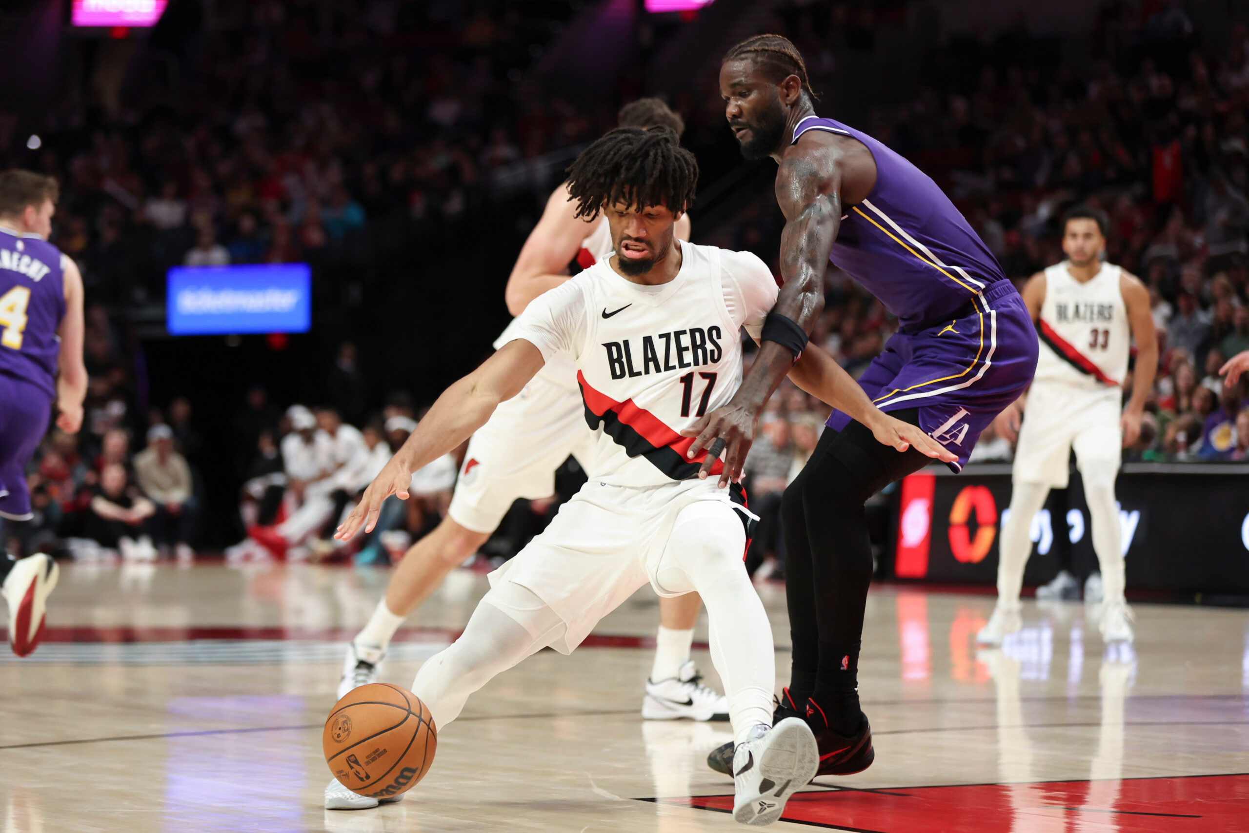 Portland Trail Blazers guard Shaedon Sharpe (17) is fouled by...