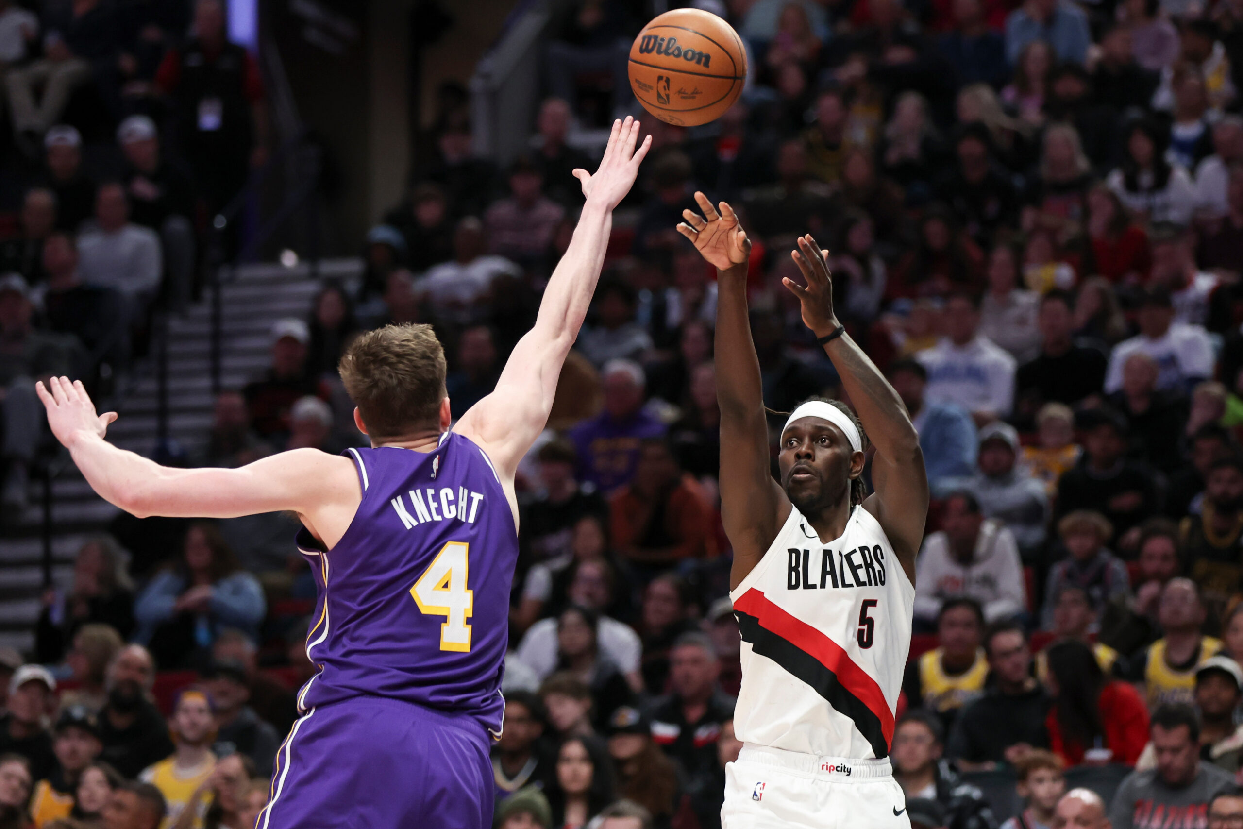 Portland Trail Blazers guard Jrue Holiday (5) shoots over Lakers...