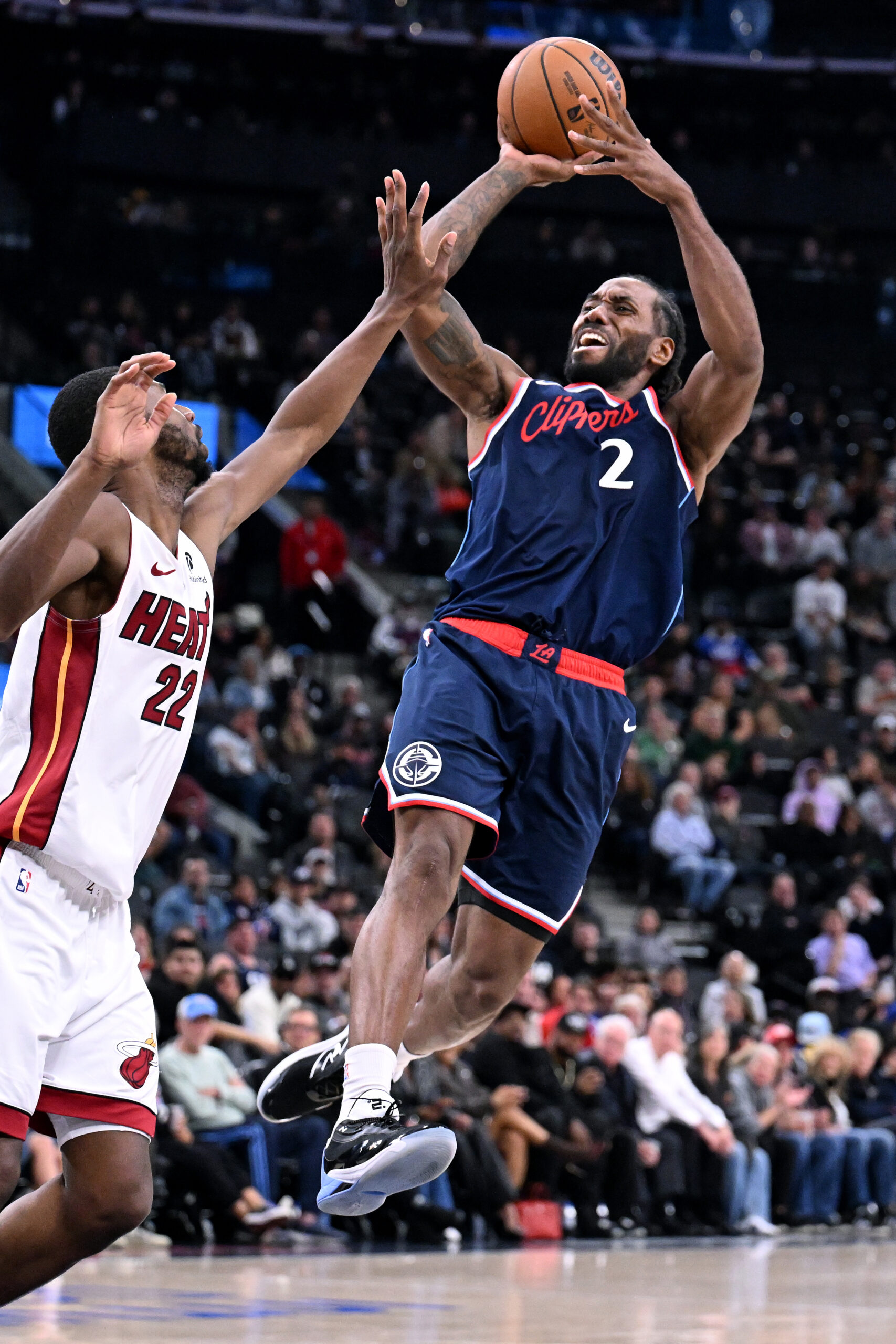 Clippers forward Kawhi Leonard takes a shot against Miami Heat...