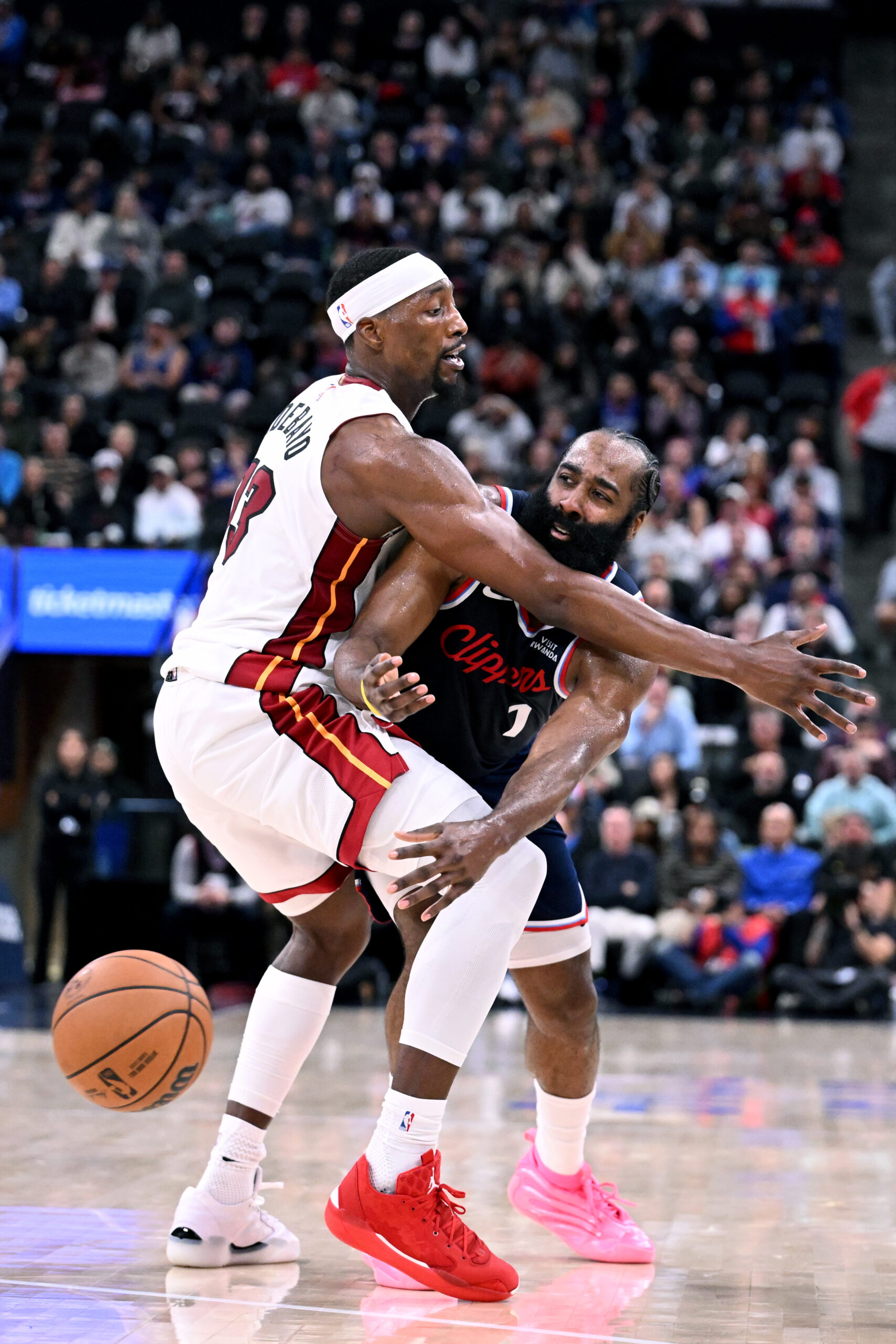 Clippers guard James Harden gets a pass off against Miami...