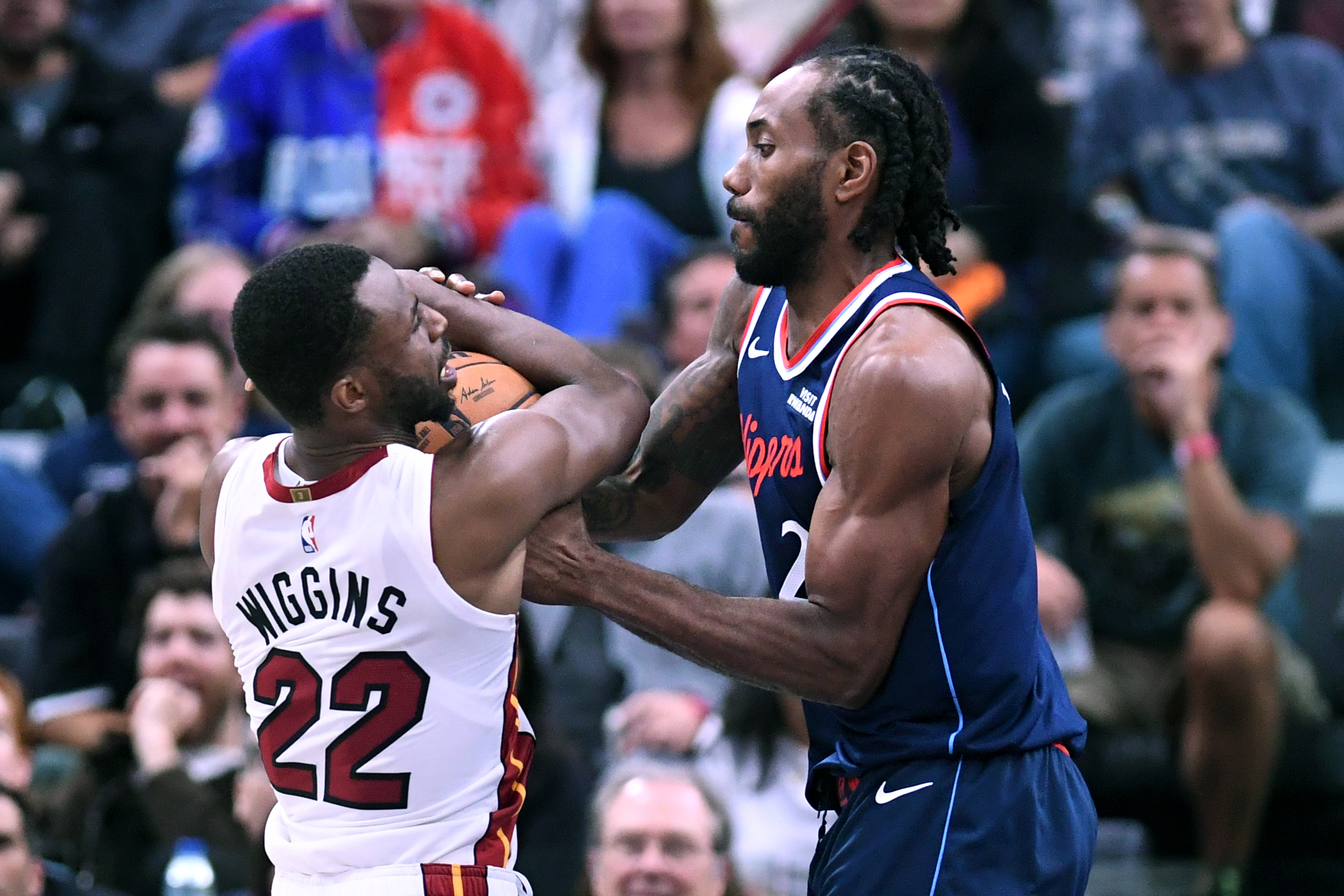 Clippers forward Kawhi Leonard forces Miami Heat forward Andrew Wiggins...