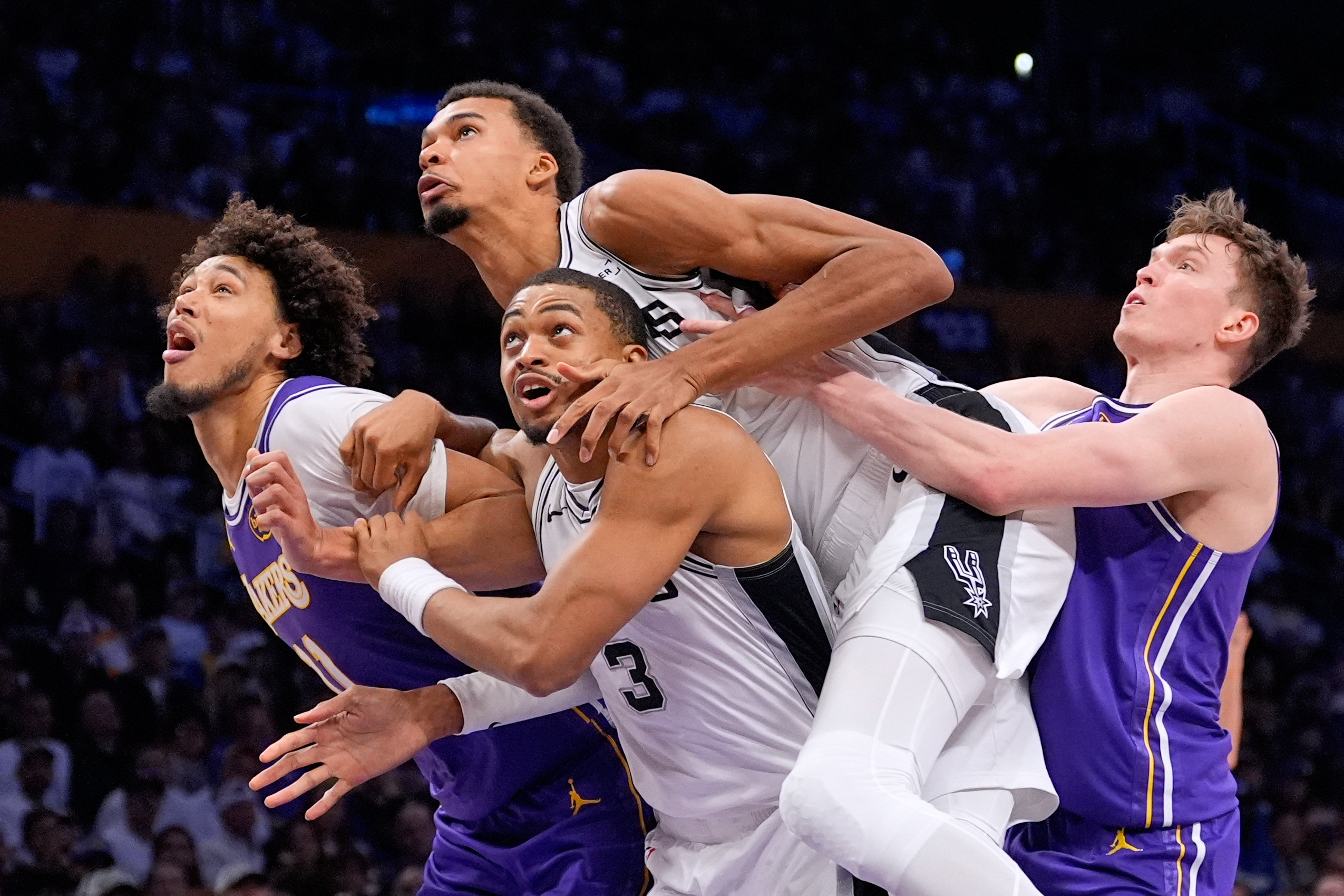 Lakers center Jaxson Hayes, left, San Antonio Spurs forward Keldon...