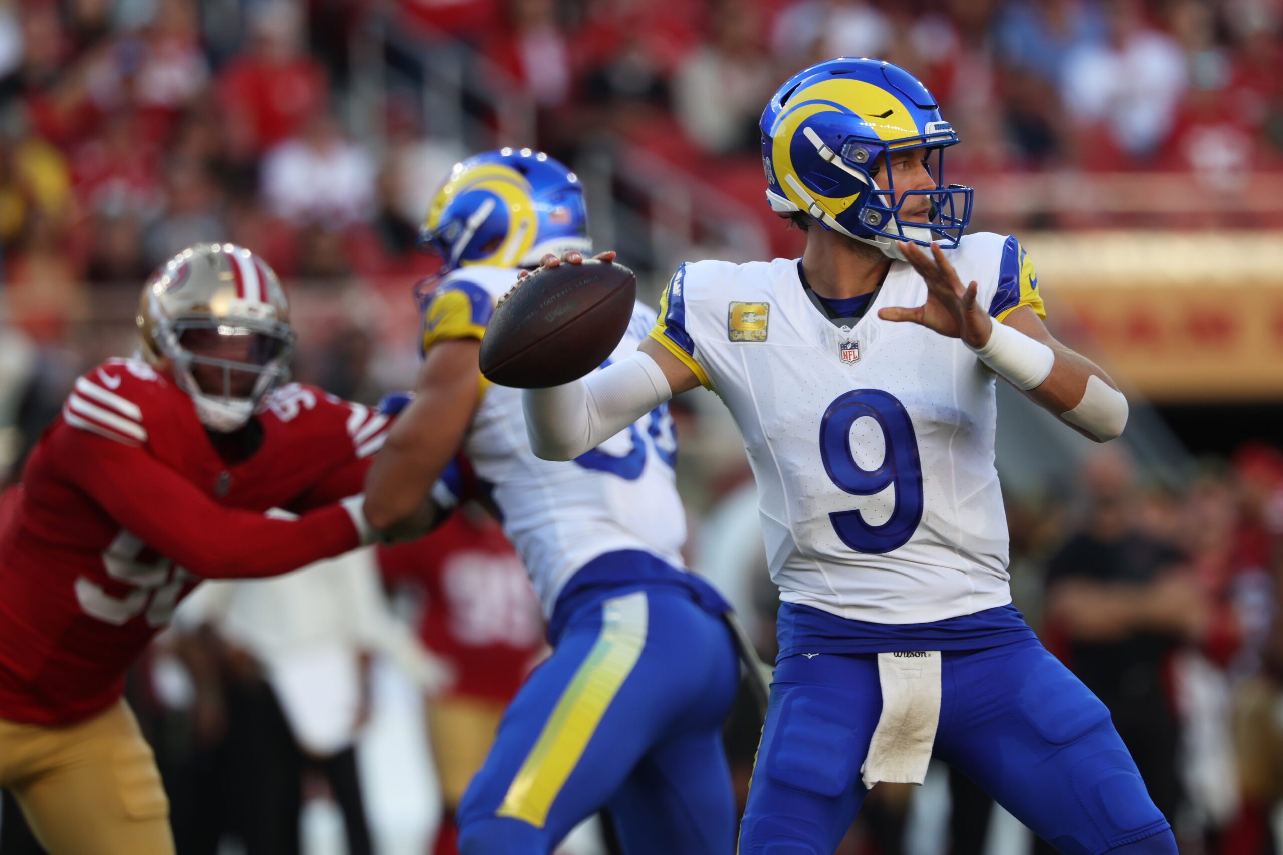 Rams quarterback Matthew Stafford (9) passes against the San Francisco...