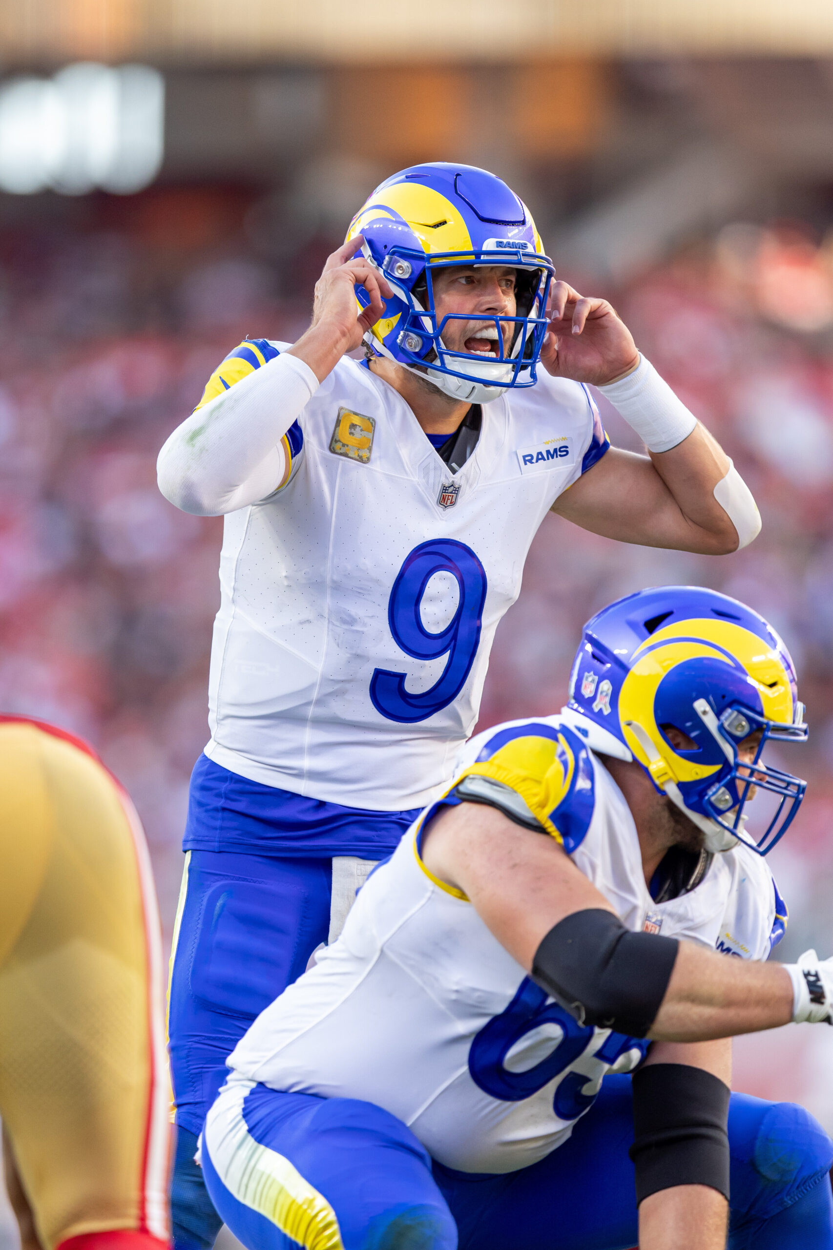 Rams quarterback Matthew Stafford (9) calls an audible against the...