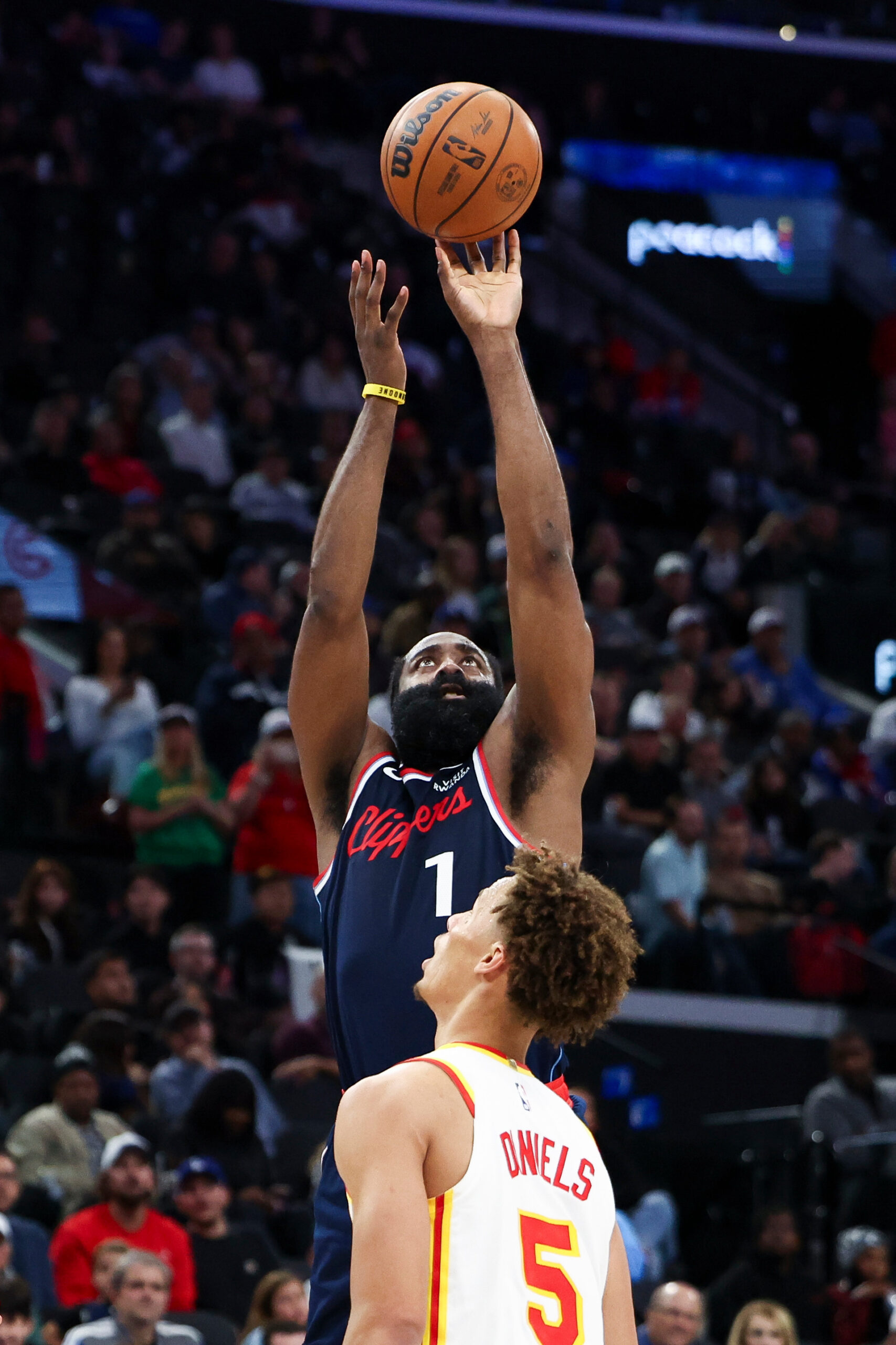 Clippers guard James Harden shoots against Atlanta Hawks guard Dyson...