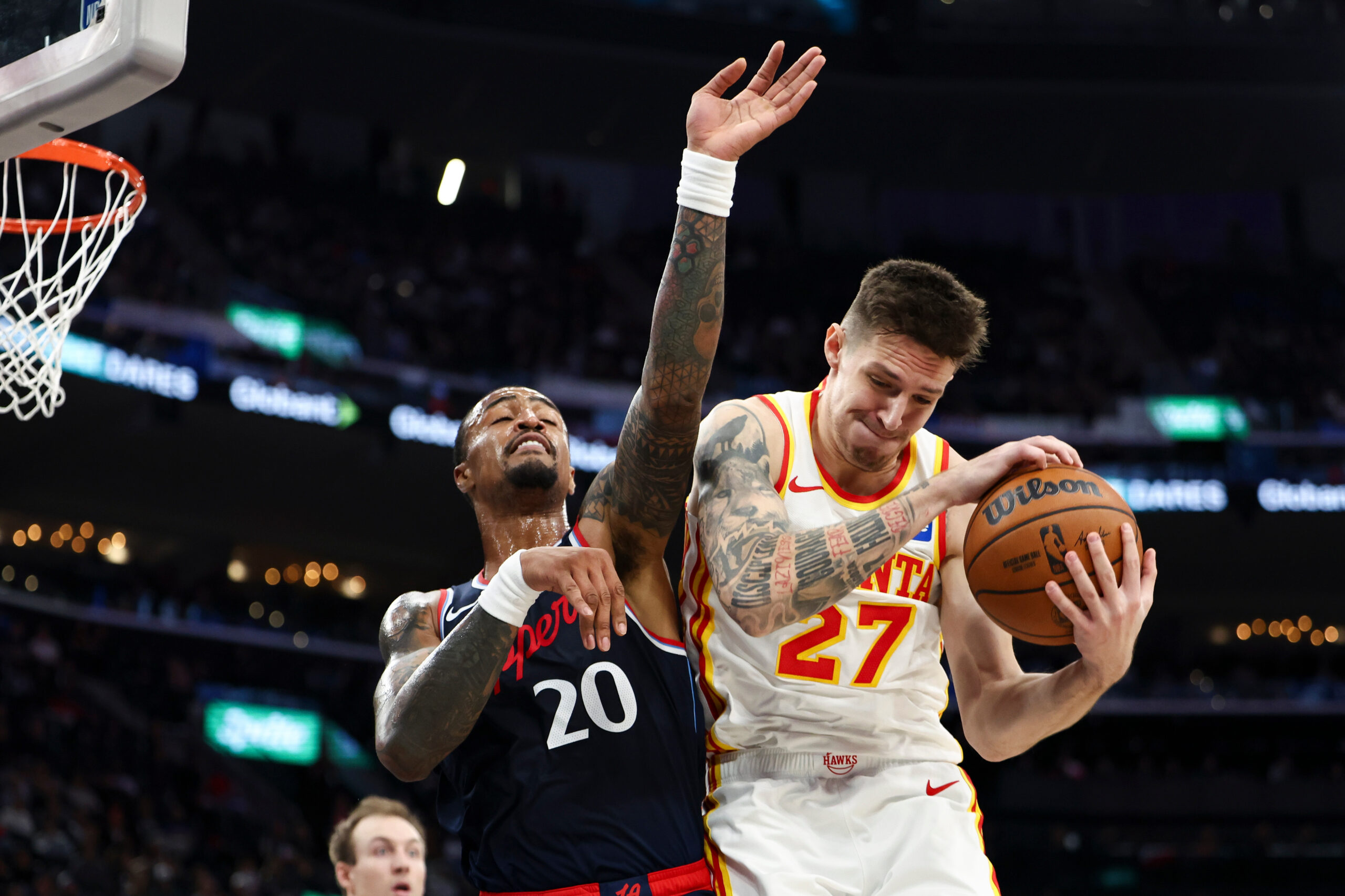 Atlanta Hawks guard Vit Krejci (27) rebounds the ball against...
