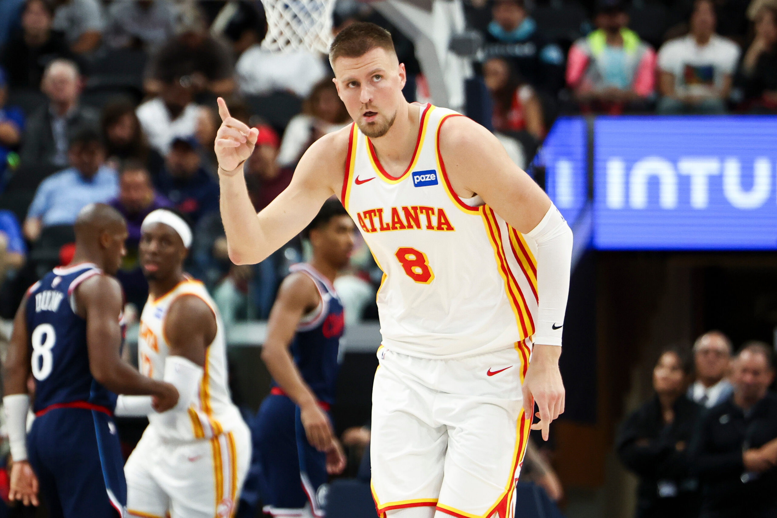 Atlanta Hawks center Kristaps Porzingis (8) gestures after scoring a...