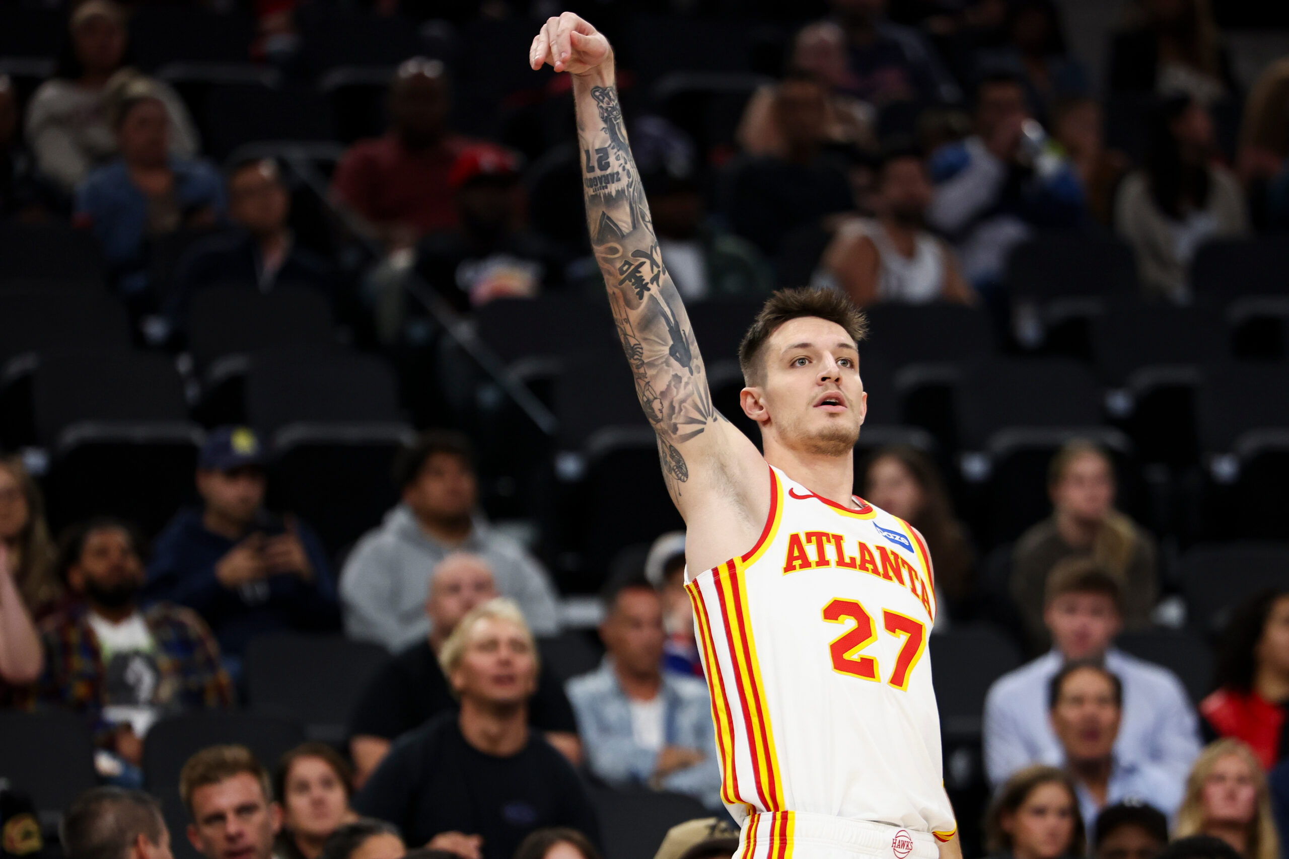 Atlanta Hawks guard Vit Krejci (27) follows through on a...