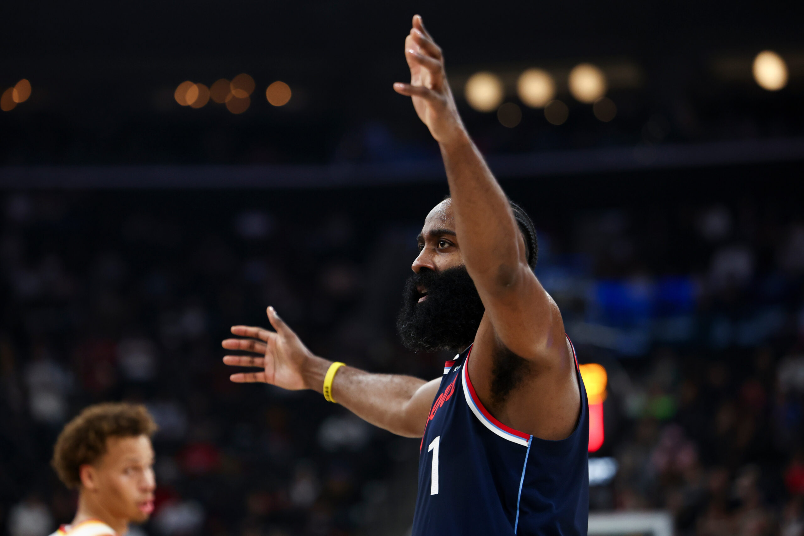 Clippers guard James Harden gestures after a call during the...