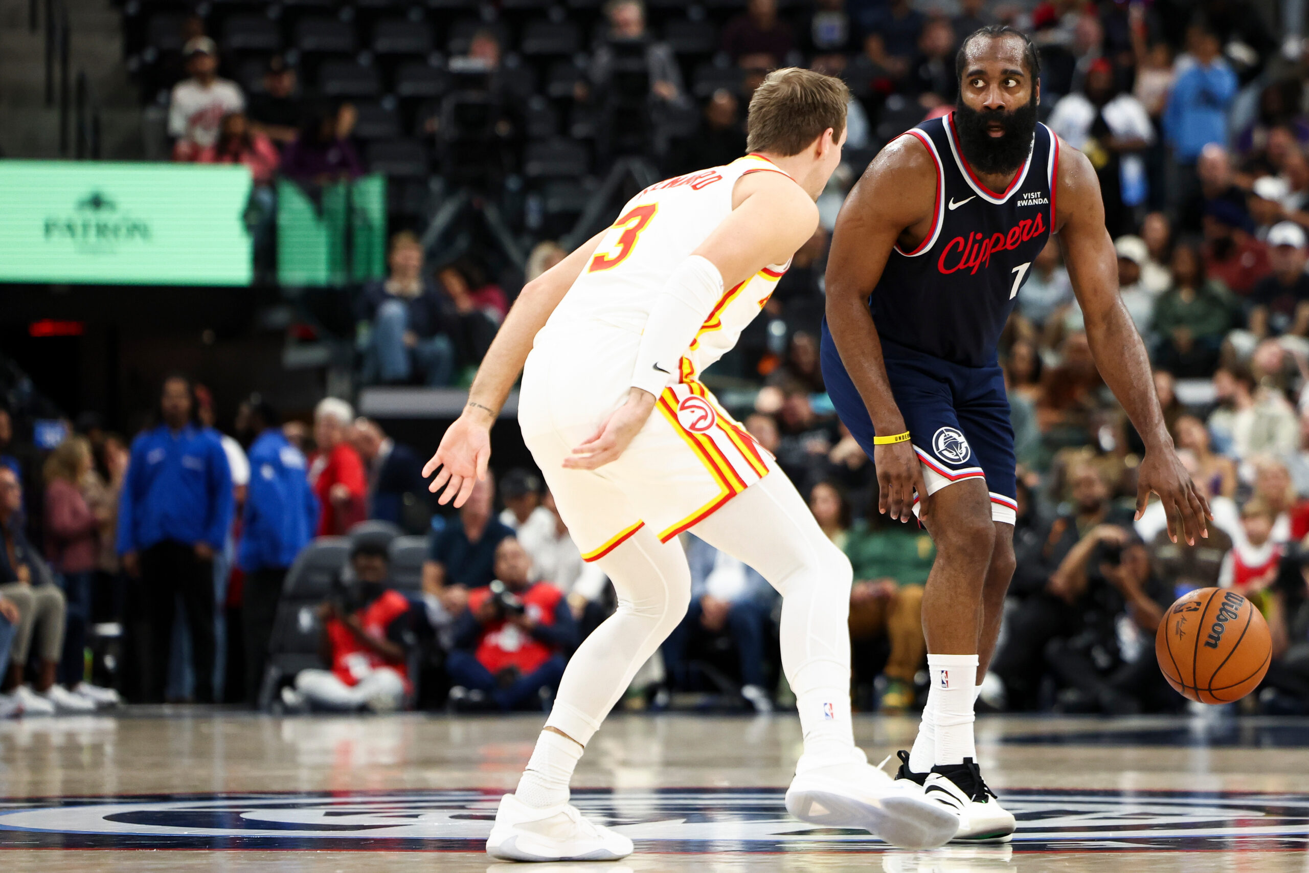 Clippers guard James Harden (1) dribbles against Atlanta Hawks guard...