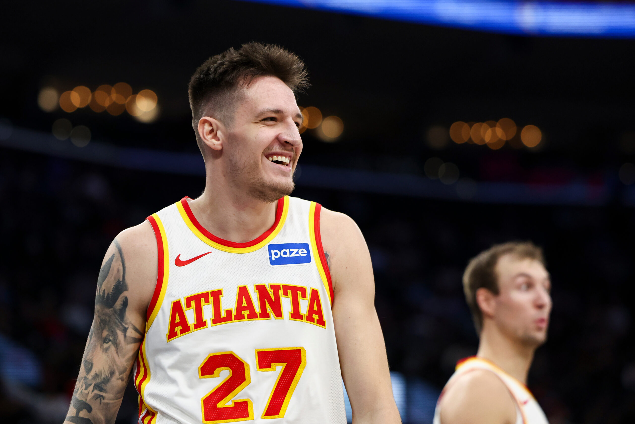 Atlanta Hawks guard Vit Krejci (27) reacts as guard Luke...