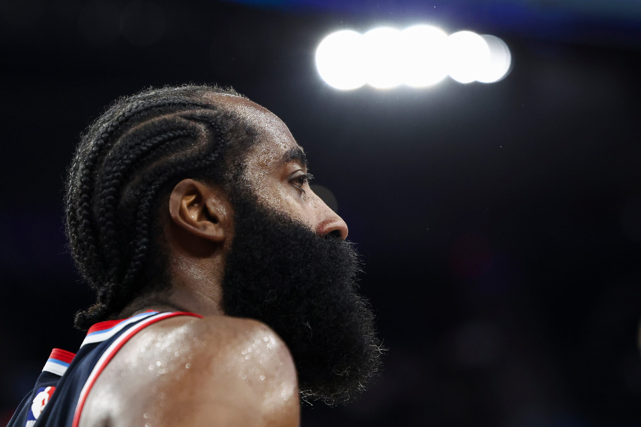 Clippers guard James Harden looks on during the second half...