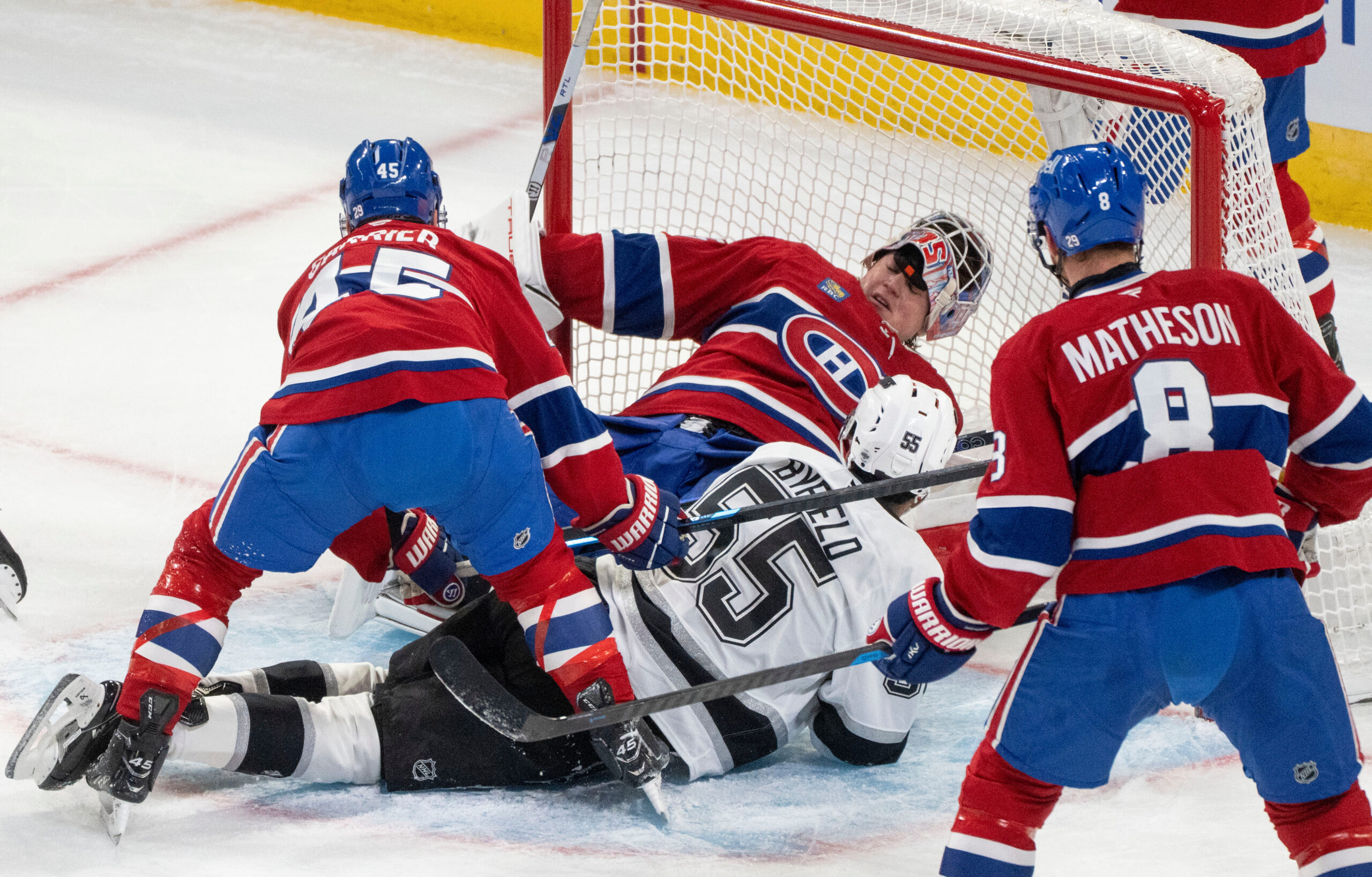 Montreal Canadiens goaltender Sam Montembeault (35) loses his mask as...