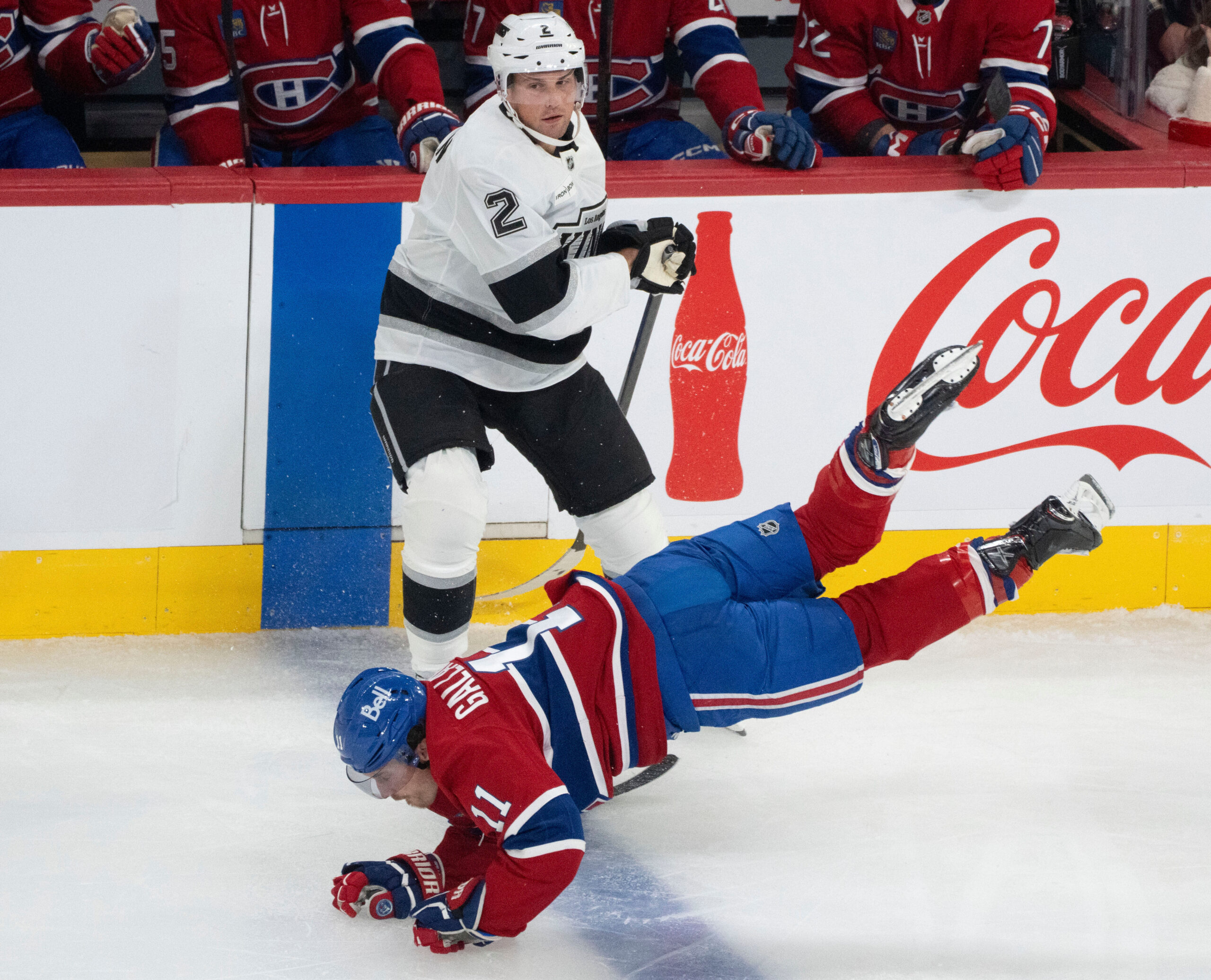 The Montreal Canadiens’ Brendan Gallagher, bottom, is tripped up in...