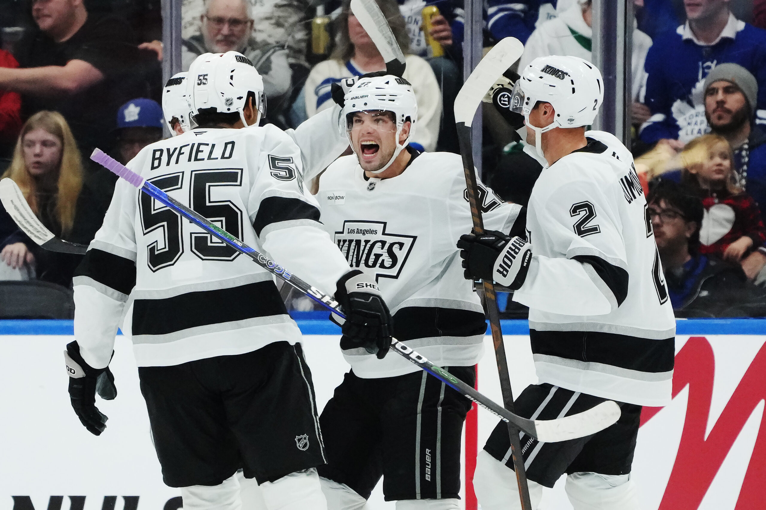 The Kings’ Kevin Fiala, center, celebrates his goal with Quinton...