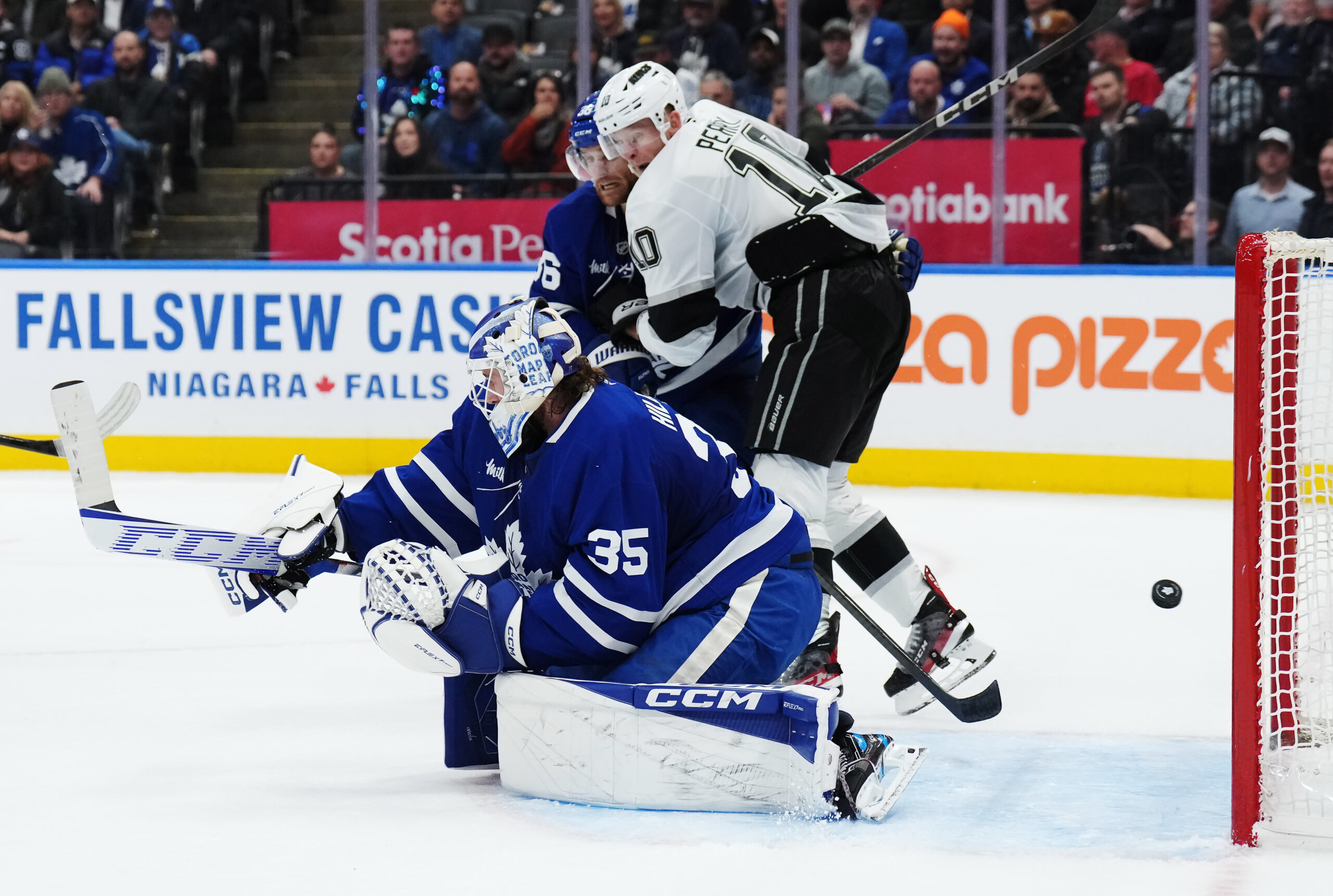 Toronto Maple Leafs goaltender Dennis Hildeby (35) is scored upon...